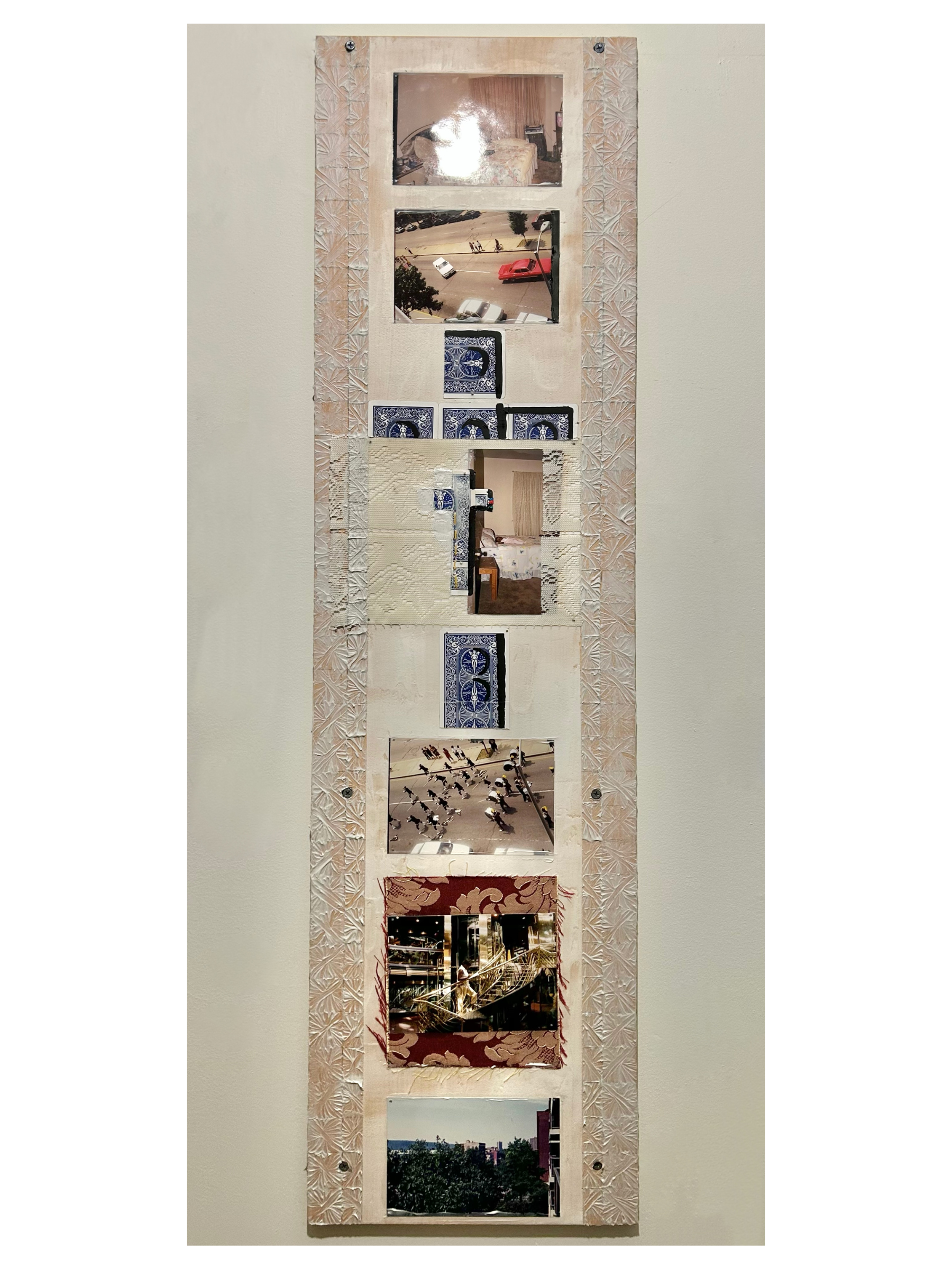 “twinkle” 2023 Molding paste, archival family photographs, textiles, playing cards, flashe paint on repurposed wood. 41.5 x 11.5”