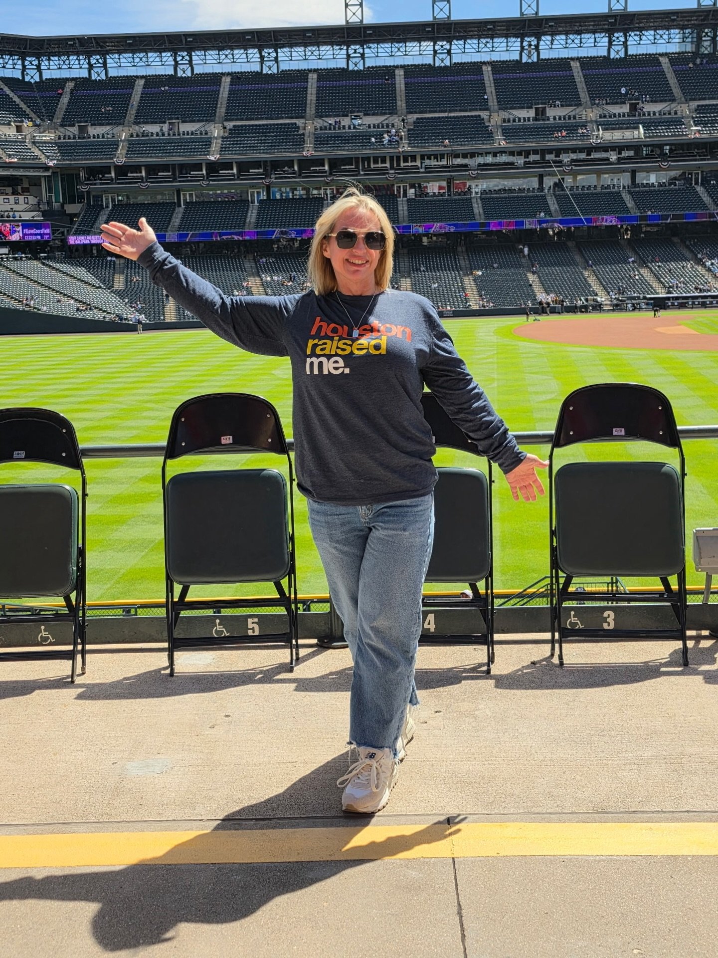 The only thing good happening at Coors Field is Melissa repping the Houston Raised Me special request long sleeve. (Collab with @stillfoundry )