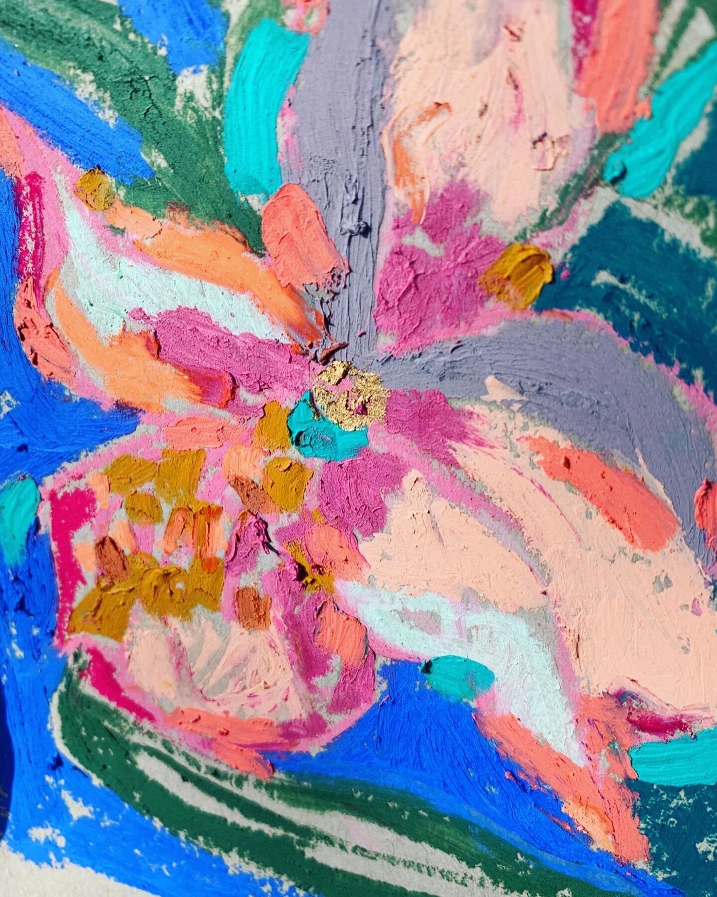Abstract painting with colorful brushstrokes resembling a flower