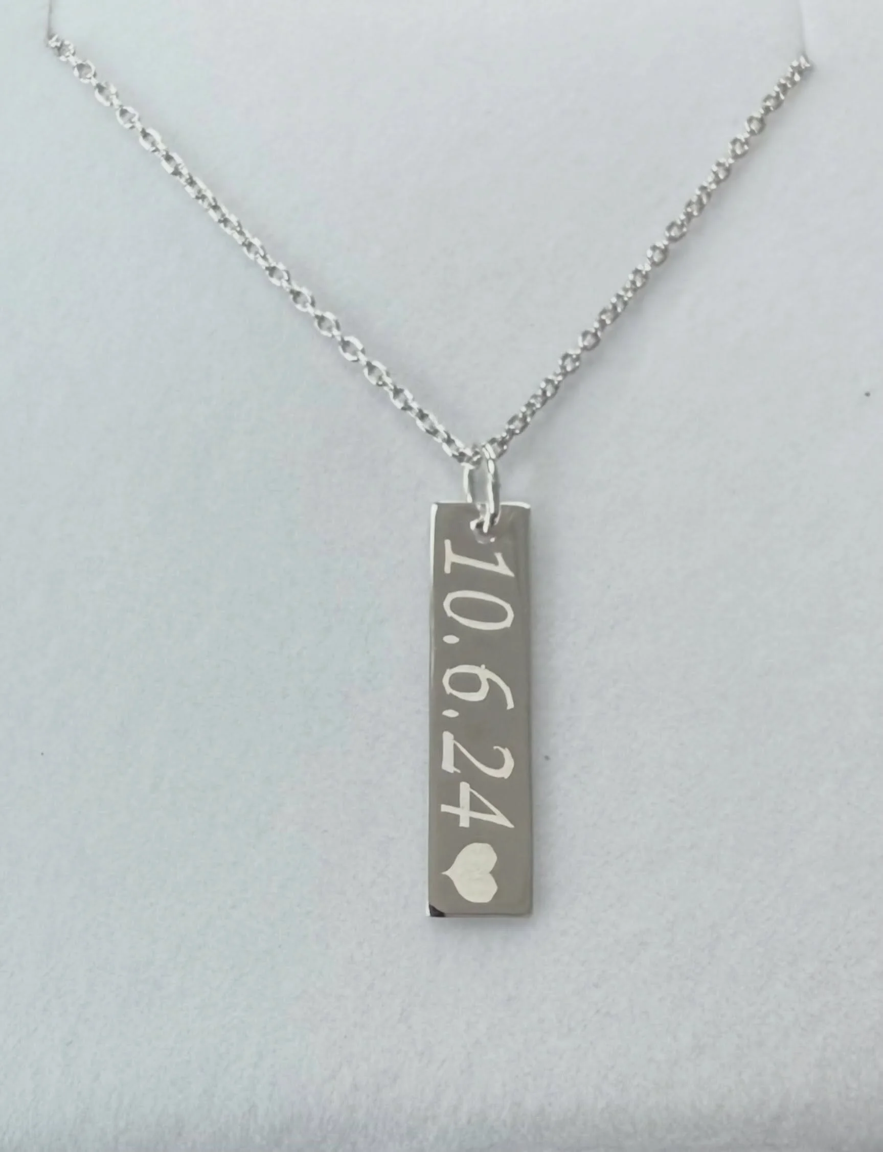 Celebrate an anniversary, birthday, milestone, favorite person, or simply a moment you never want to forget. &hearts;️

This sleek vertical bar pendant can be personalized with a special date, name, word, or symbol making it a beautiful way to carry 