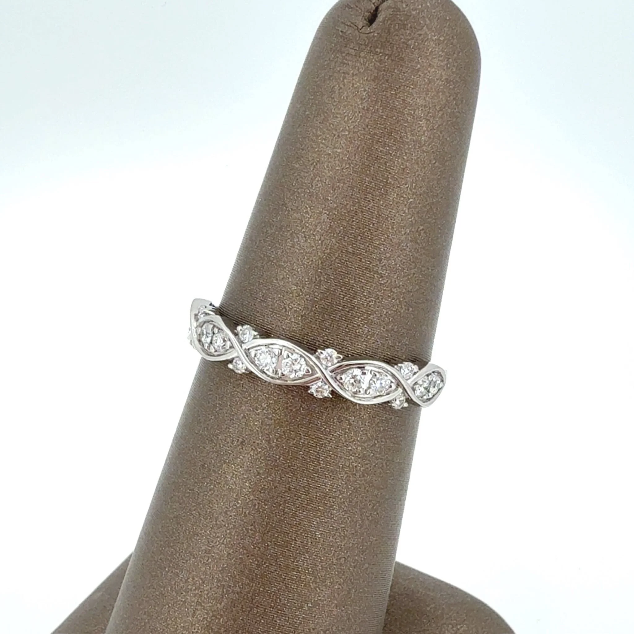 Elegant, timeless and made to be treasured, this platinum diamond band is a beautiful addition to any jewelry collection. The classic design makes it easy to wear every day, stack with your favorite rings or pair with an engagement ring for a look th