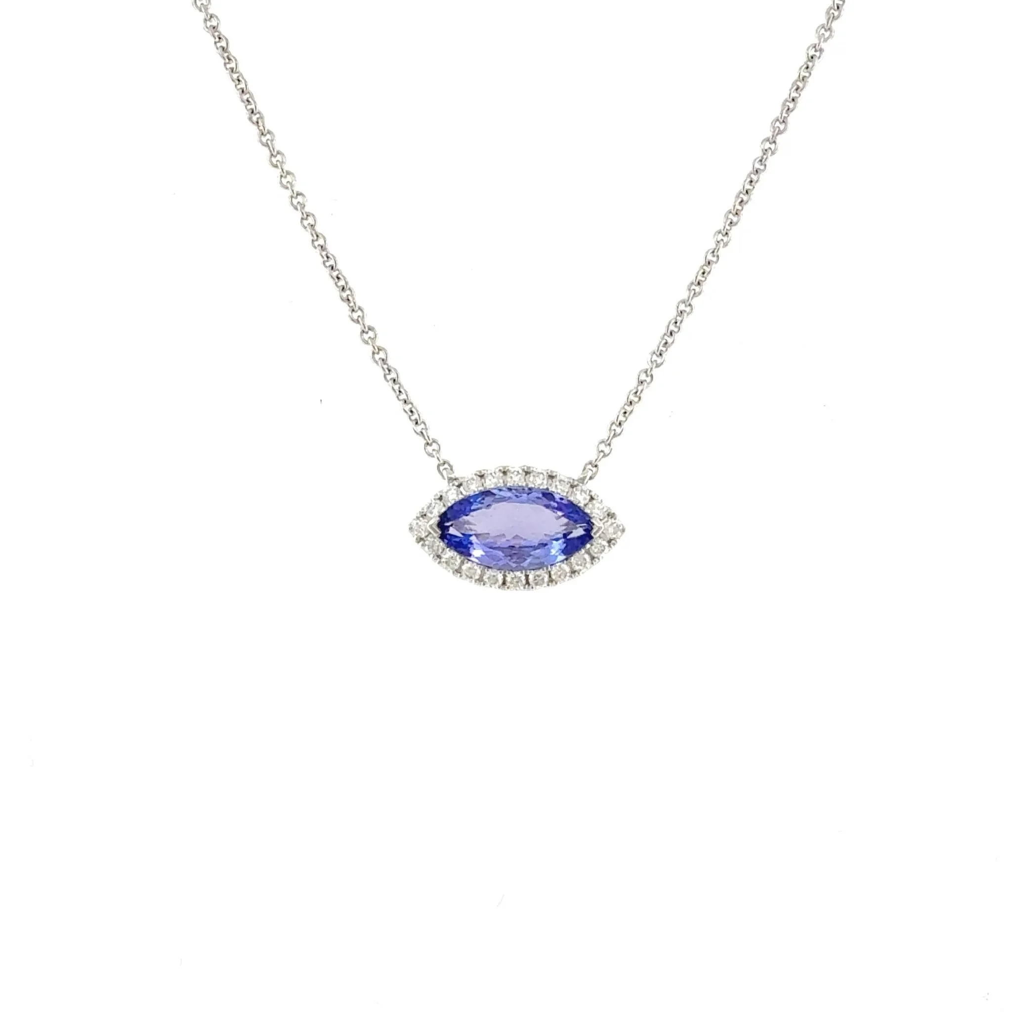 A beautiful pop of color with timeless elegance: 14K White Gold Marquise Tanzanite and Diamond Halo Necklace 💙 

This 14K white gold necklace features a vibrant marquise-cut tanzanite surrounded by a delicate halo of diamonds, creating a design that