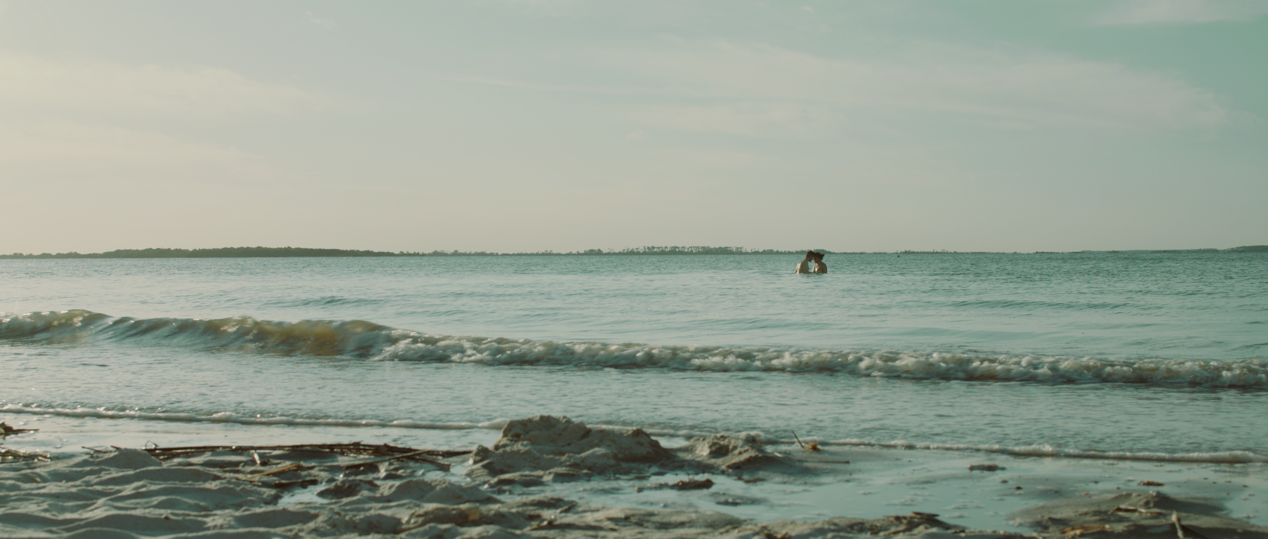 BOYS IN THE WATER WIDE SHOT.png