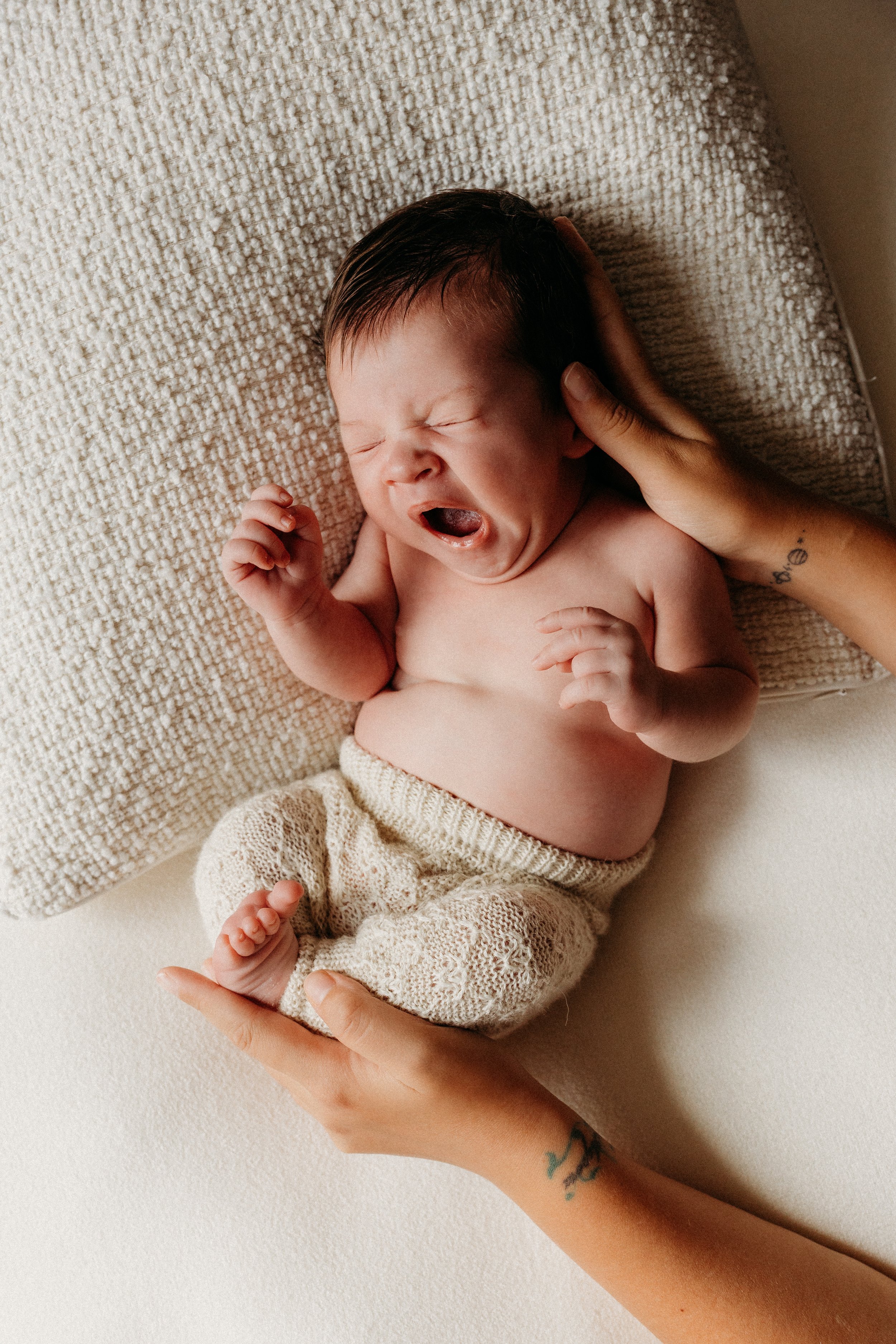 Newborn photography yawns