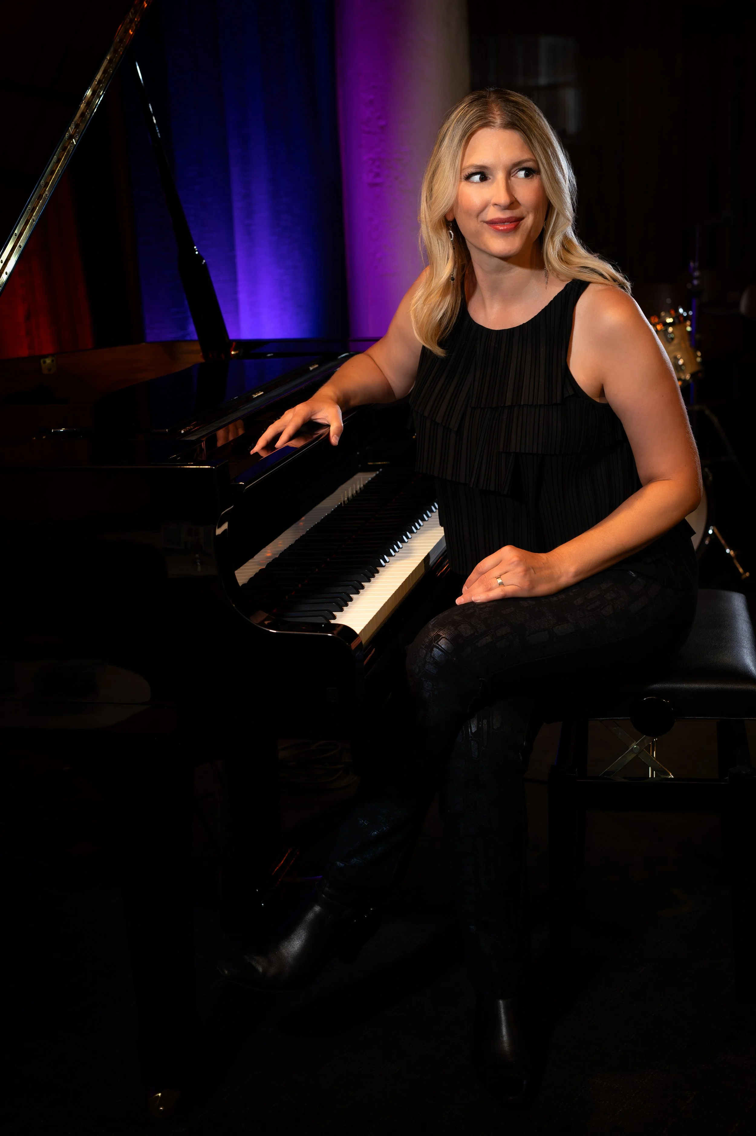 Jo Ann Daugherty at the piano vertical.jpg