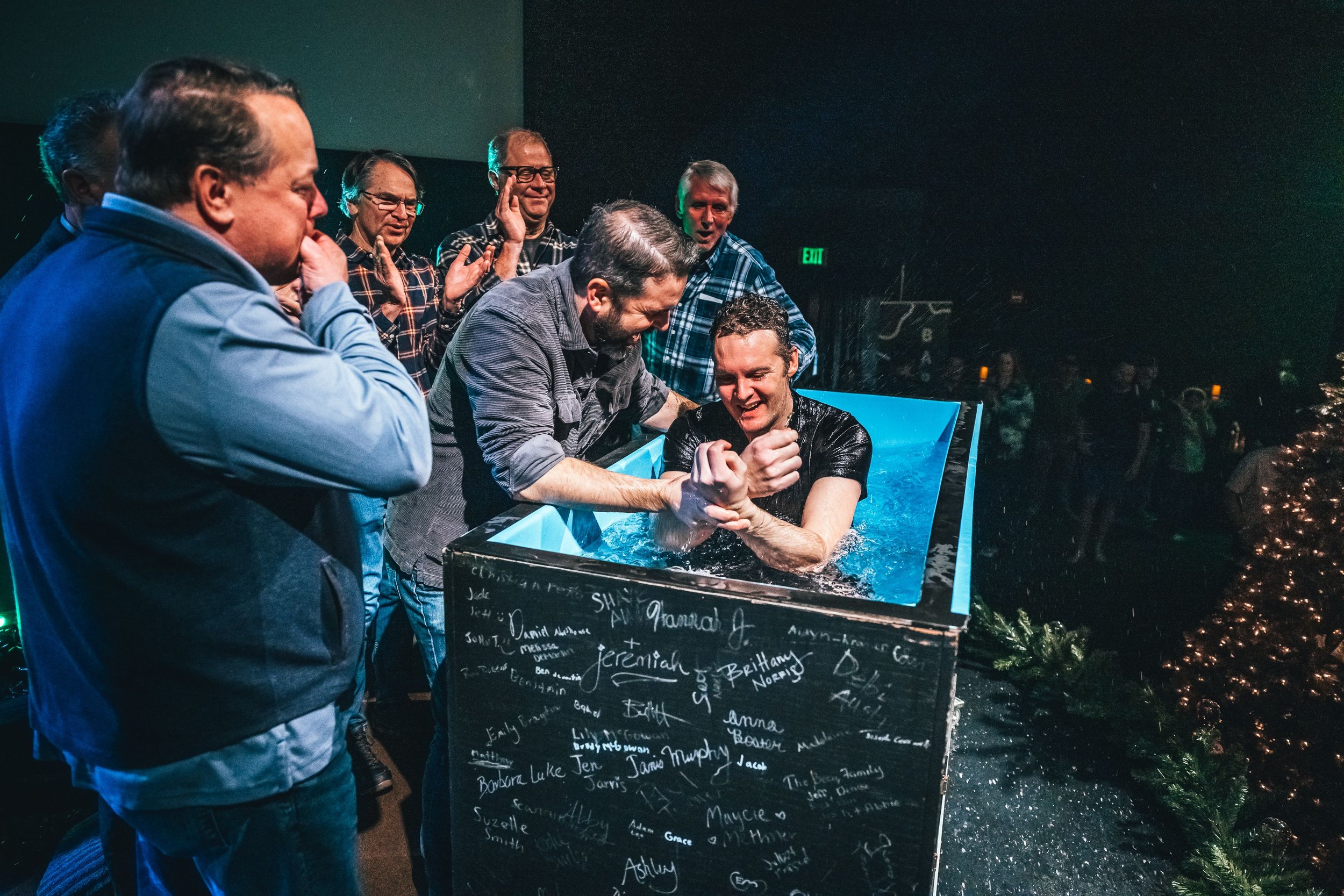 Rooted celebration man with guys group.jpeg