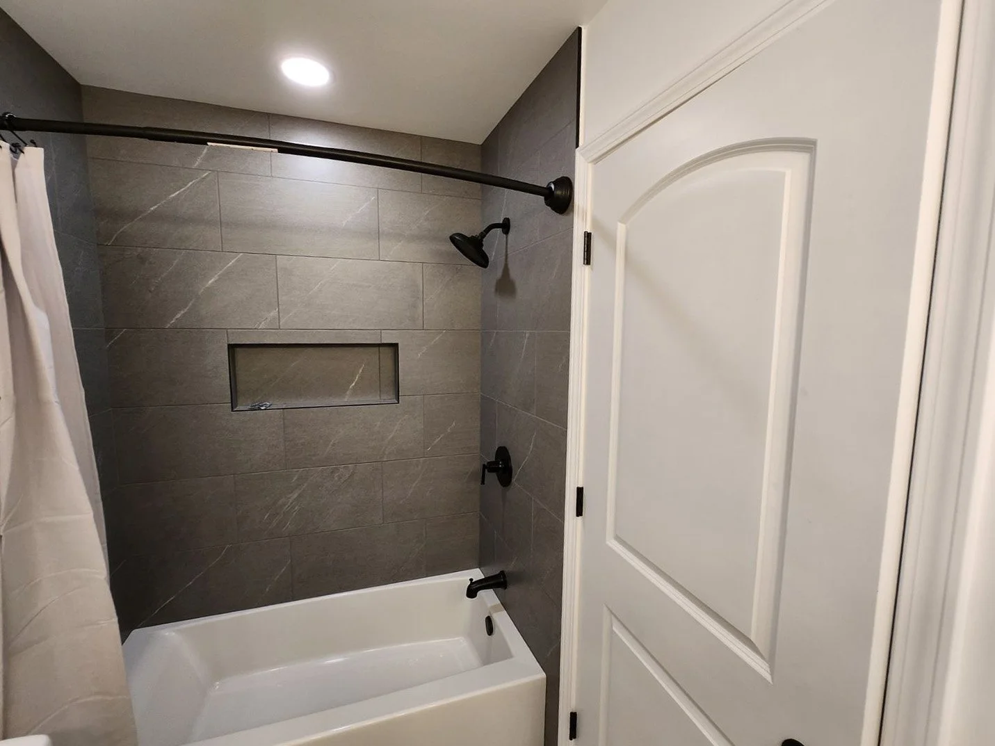 CUSTOM SHOWER TILE AND NICHE.jpg