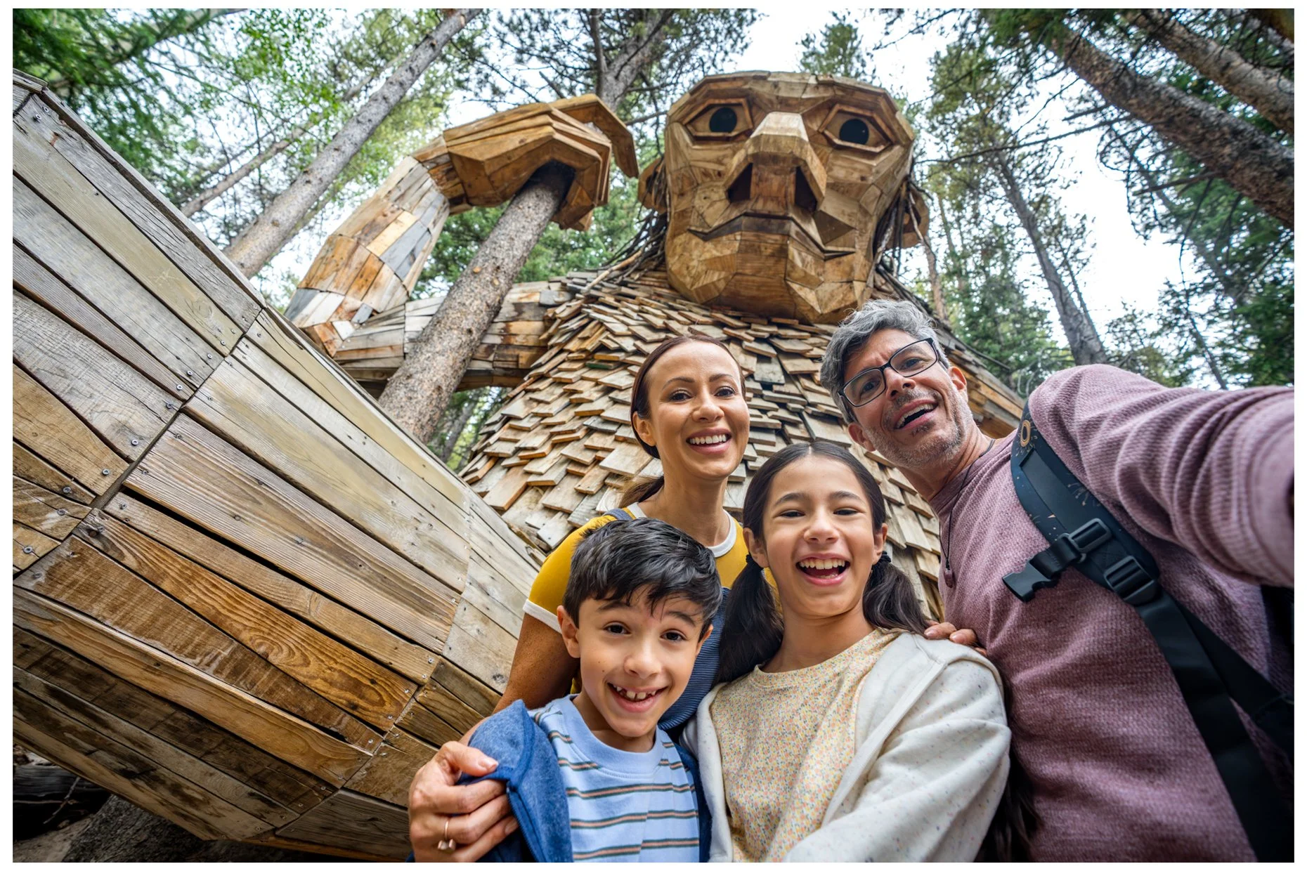 Family-Selfie-with-Wooden-Troll-Sculpture-is20250806_iD_Buzz_0849.jpg