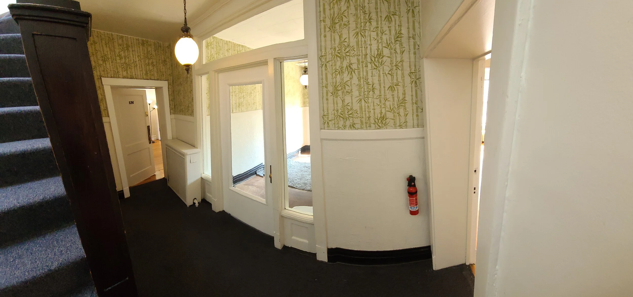 Front Entry to Building and Stairs Up to Second Floor