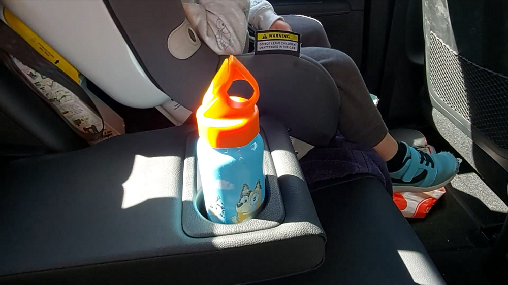 The kid has everything they could possibly need with reasonably-size cupholders...