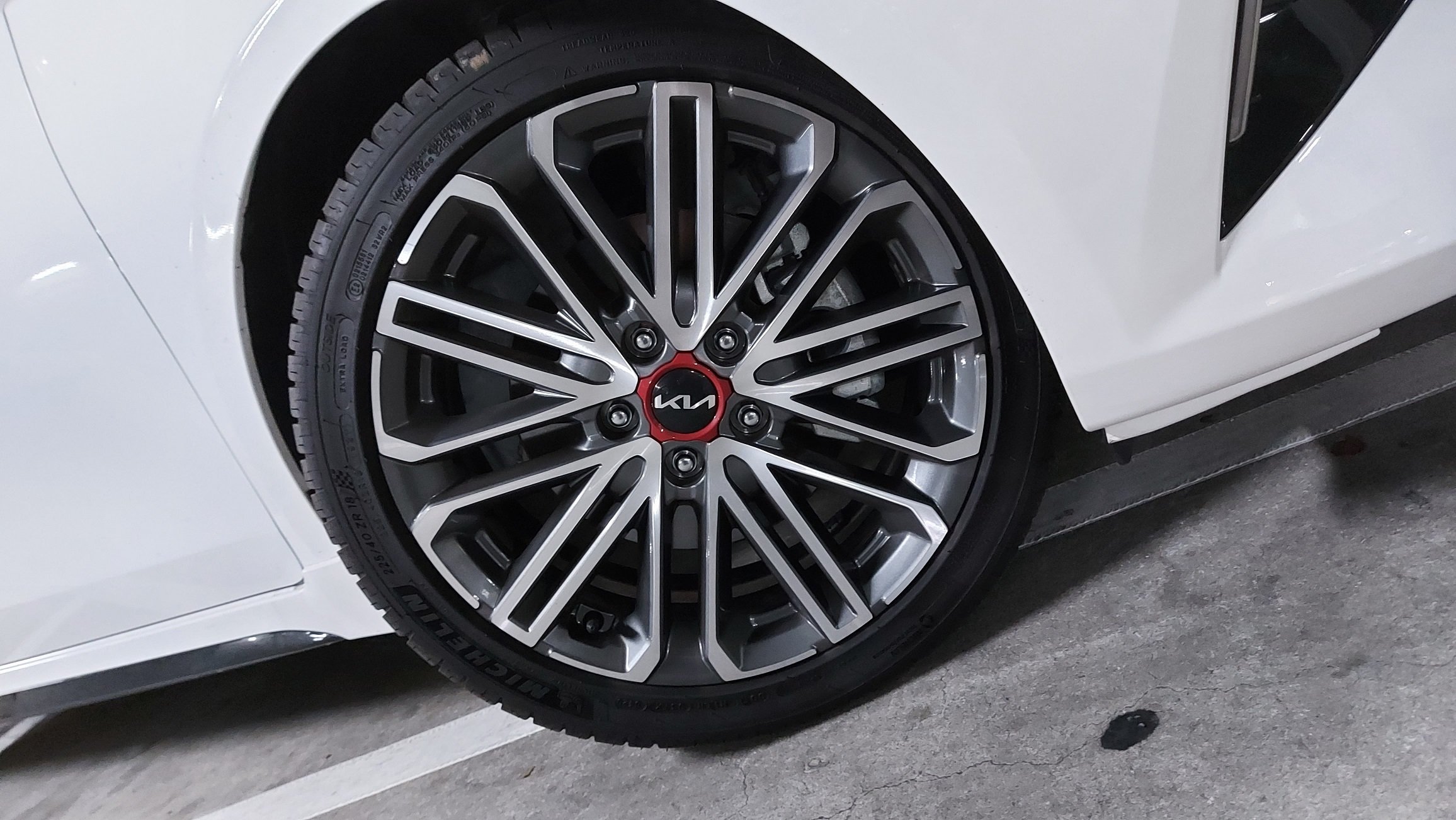 18-inch alloys + Michelin tyres don't thump over bumps like you'd expect.