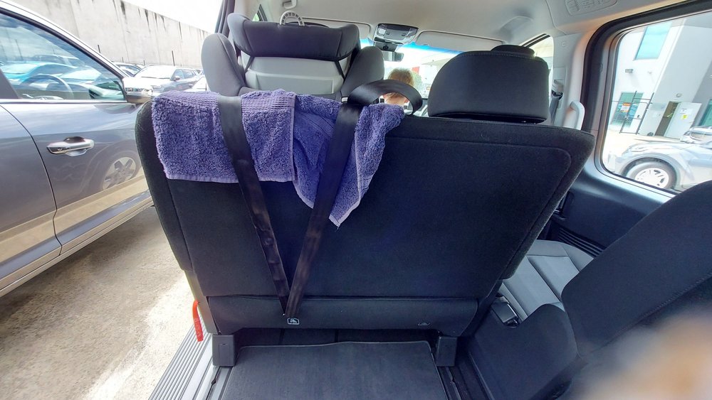 Always use an old towel to gasket between straps and seat fabric.