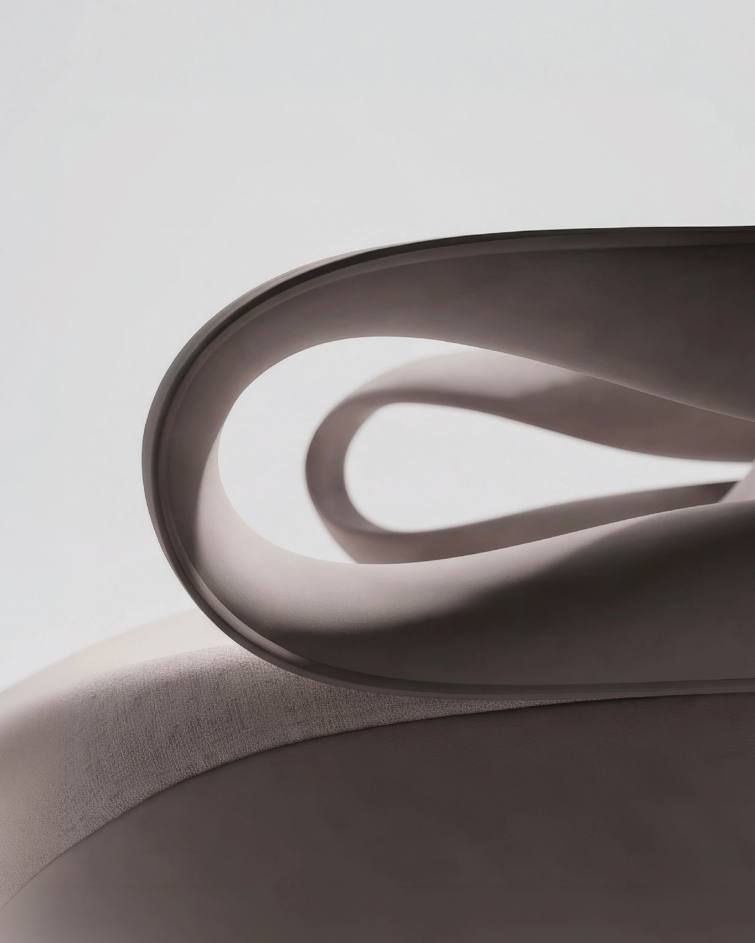LOOP
Between Form and Body.

A continuous curve creates a space between enclosure and openness.

Neither entirely inside nor outside, the boundary becomes fluid.

A quiet dialogue between the body and form.

_____________________

www.indigodesign.co