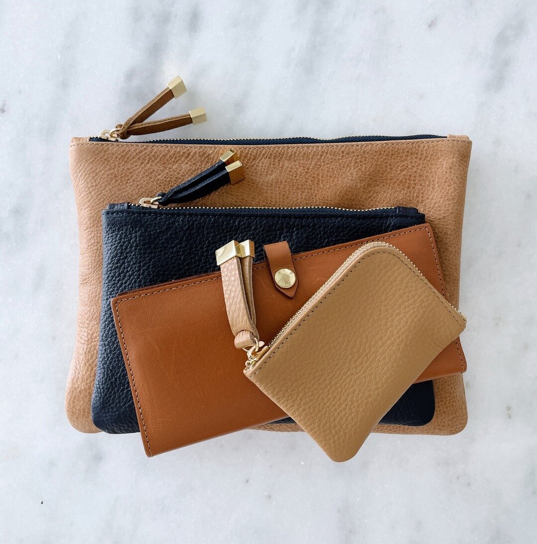 &bull; These are the go to pieces in my bag!  I never knew that my life could be that much less complicated with an organized bag but these pieces help me keep it that way!  In order bottom to top: the Vale Pouch, the TIP Pouch, the Lincoln Wallet an