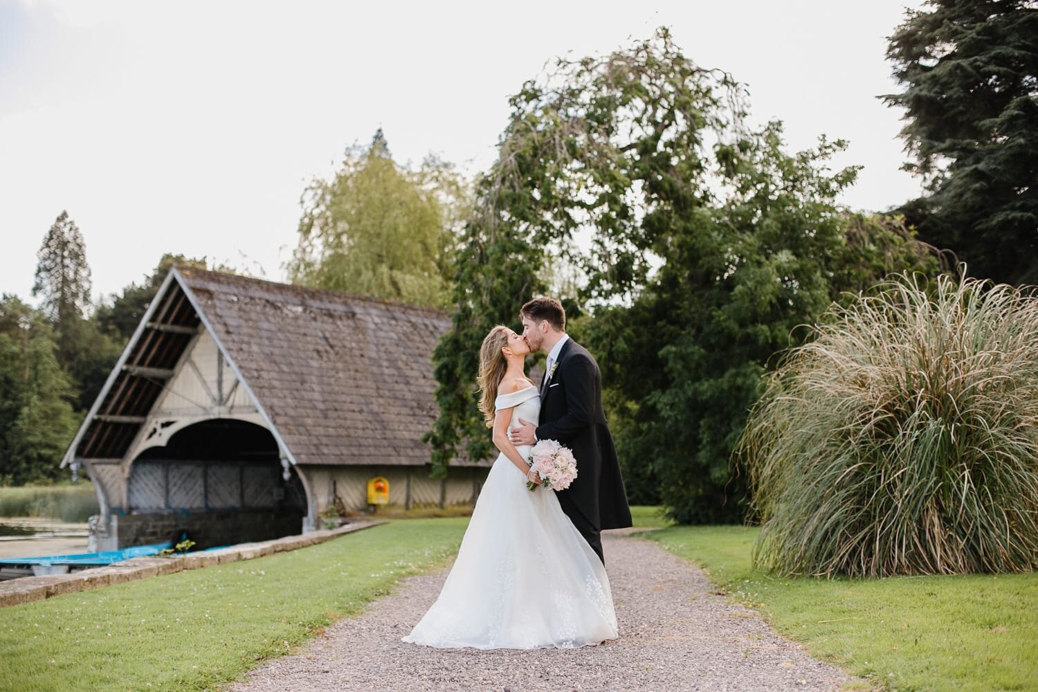 Bride And Groom By The Lake In Castle Leslie