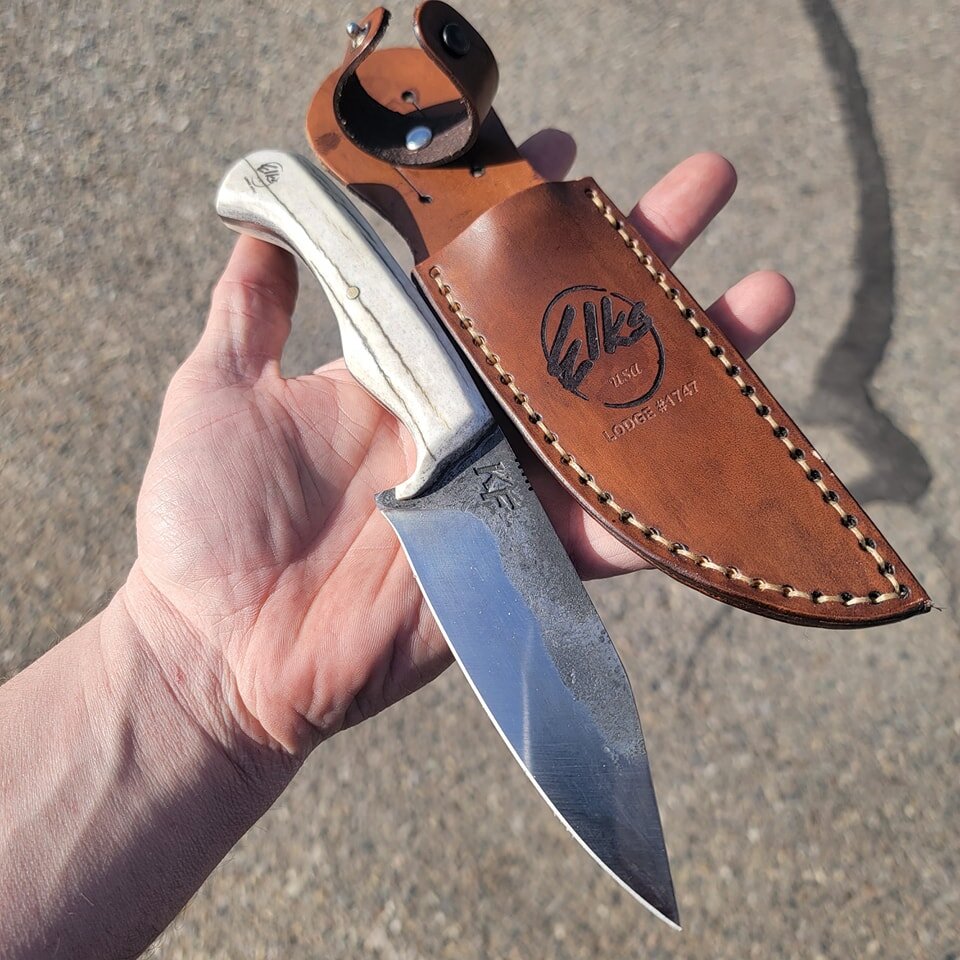 Sweet little knife I made for the Farmington elks lodge Here in town. They are having a silent auction for this guy. So make sure to go bid on it 

Brass pin, with a elk horn handle. And the steel is 80crv2 l. With a hand made sheath! It's I great ad