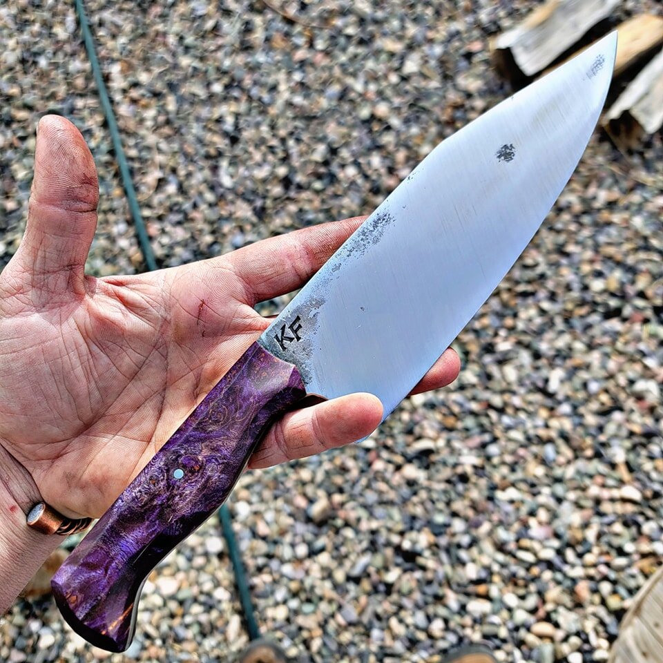 This one turned out great! For a return customer! Finely got it done! Busting out orders!! 

Curly maple dyed purple stainless steel pin.
8 inch chefs 80crv2. Sharp as a razor! 

Stay tuned for news on the gun and knife show this weekend!

 #imadethi