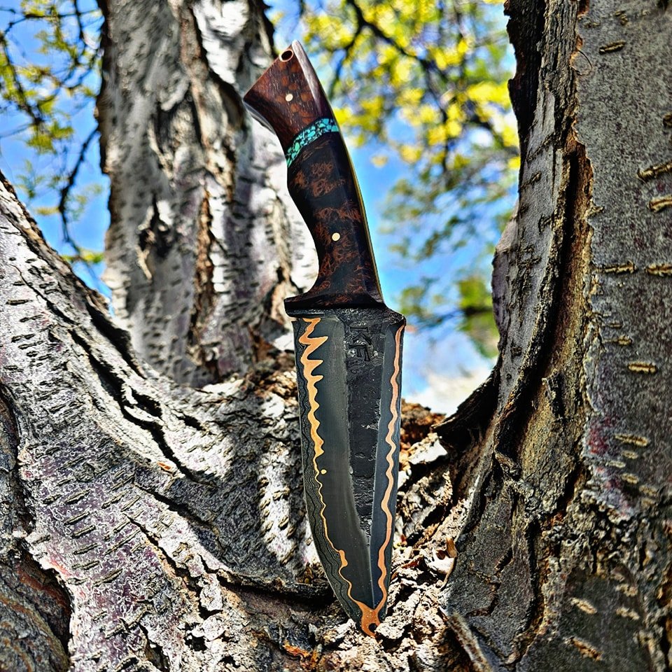 Just another day for a stunner! Cumai hawk knife with a Damascus core! This one is my favorite cu Mai I have made! One of a kind nothing else like it.

And that handle holy smokes! Can it get any better!!

 #support #farmington #father #maker #fire #