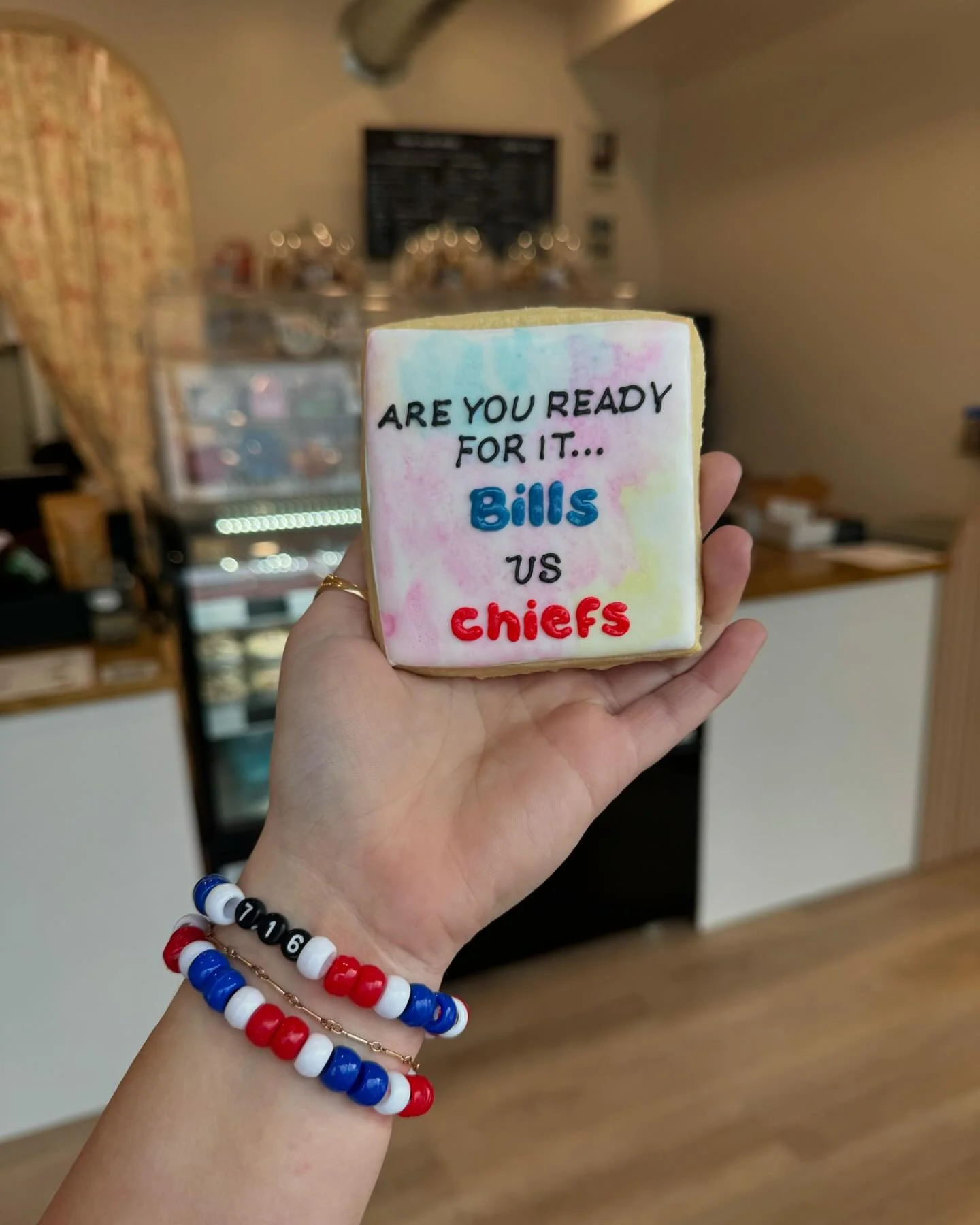 Taylor Swift coded treats in store for the BIG game😍💋

Friday 8am-5pm 
Saturday 8am-5pm
Sunday 9am-4pm

Limited quantities available! If you want to preorder a cookie cake dm us and we'll have one ready for Sunday! 

The buffalo friendship bracelet