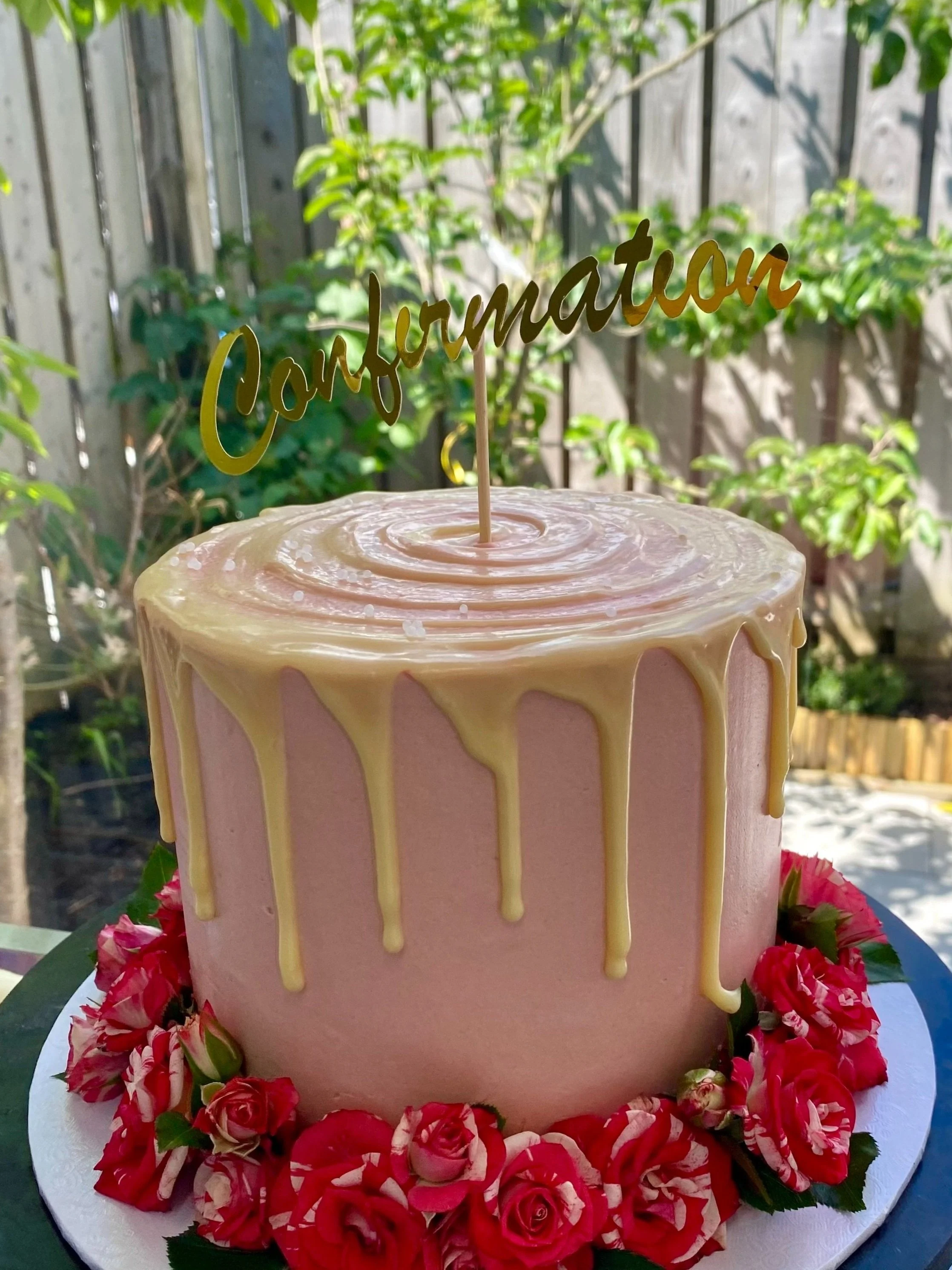 Confirmation Cake with Fresh Mini Roses around the board
