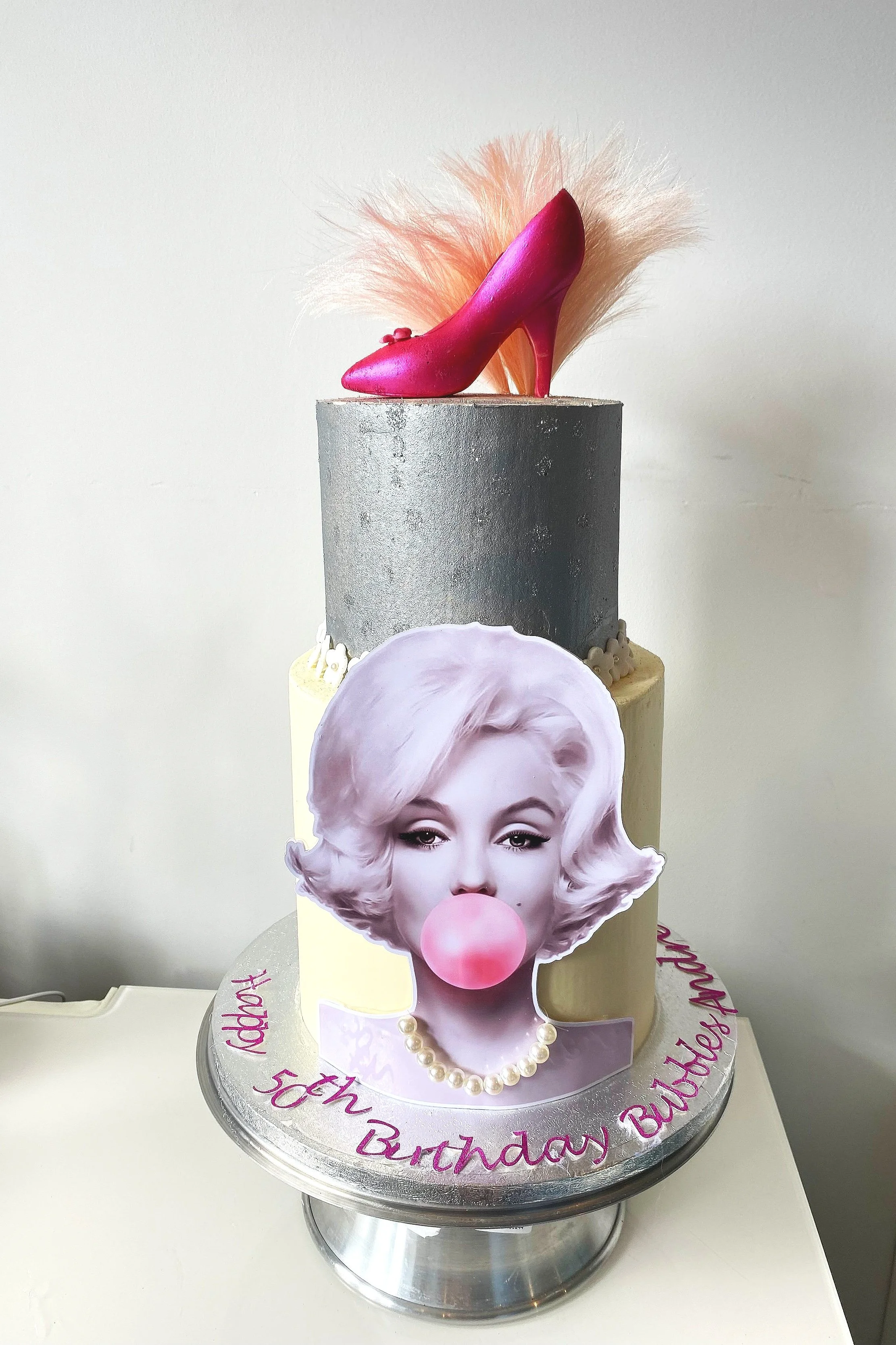 Marilyn Monroe Cake with a Pink Shoes and Feathers