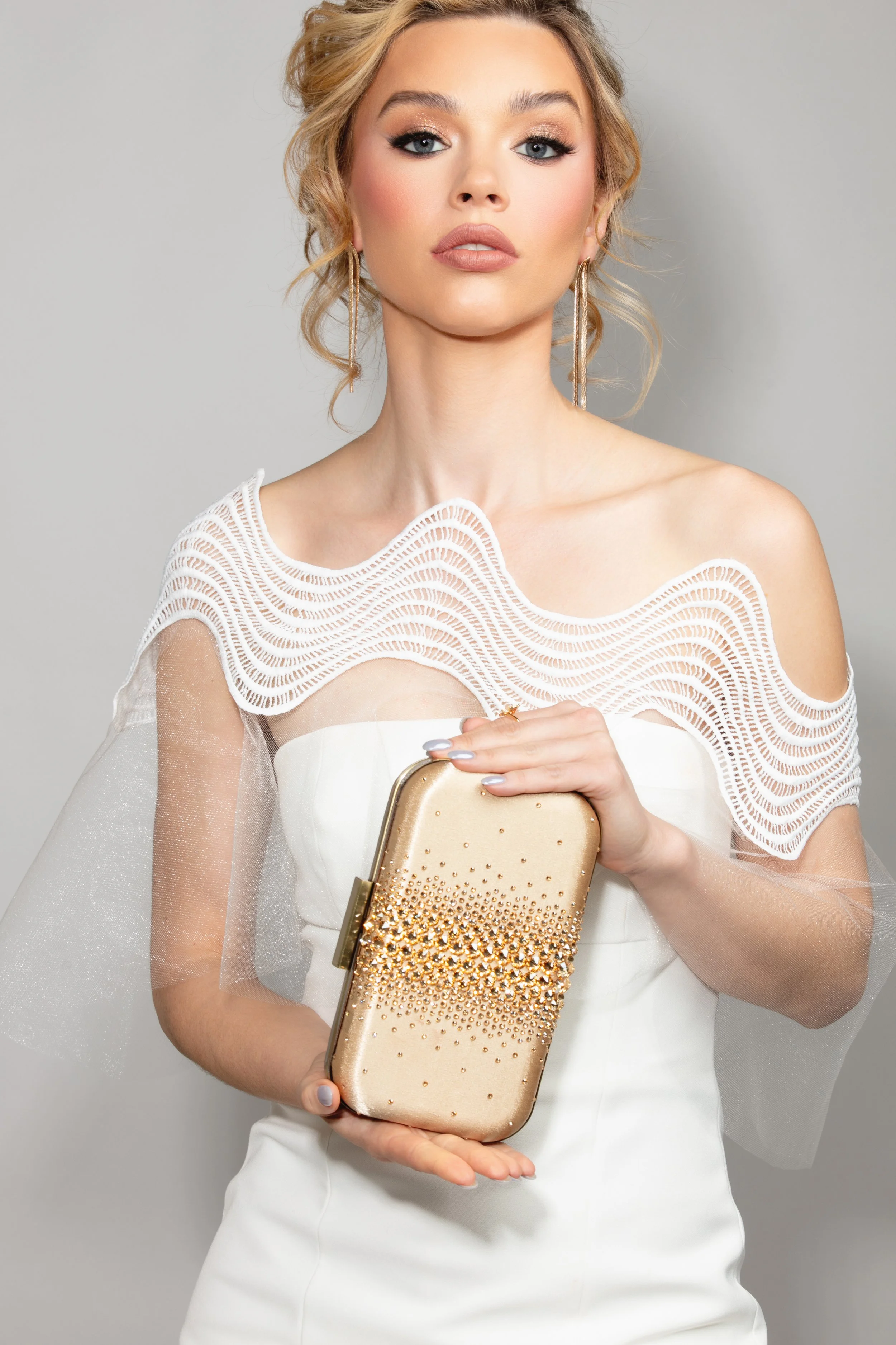 Vivian Cape, Vicky Earrings, Ella Clutch Gold_cropped.jpg