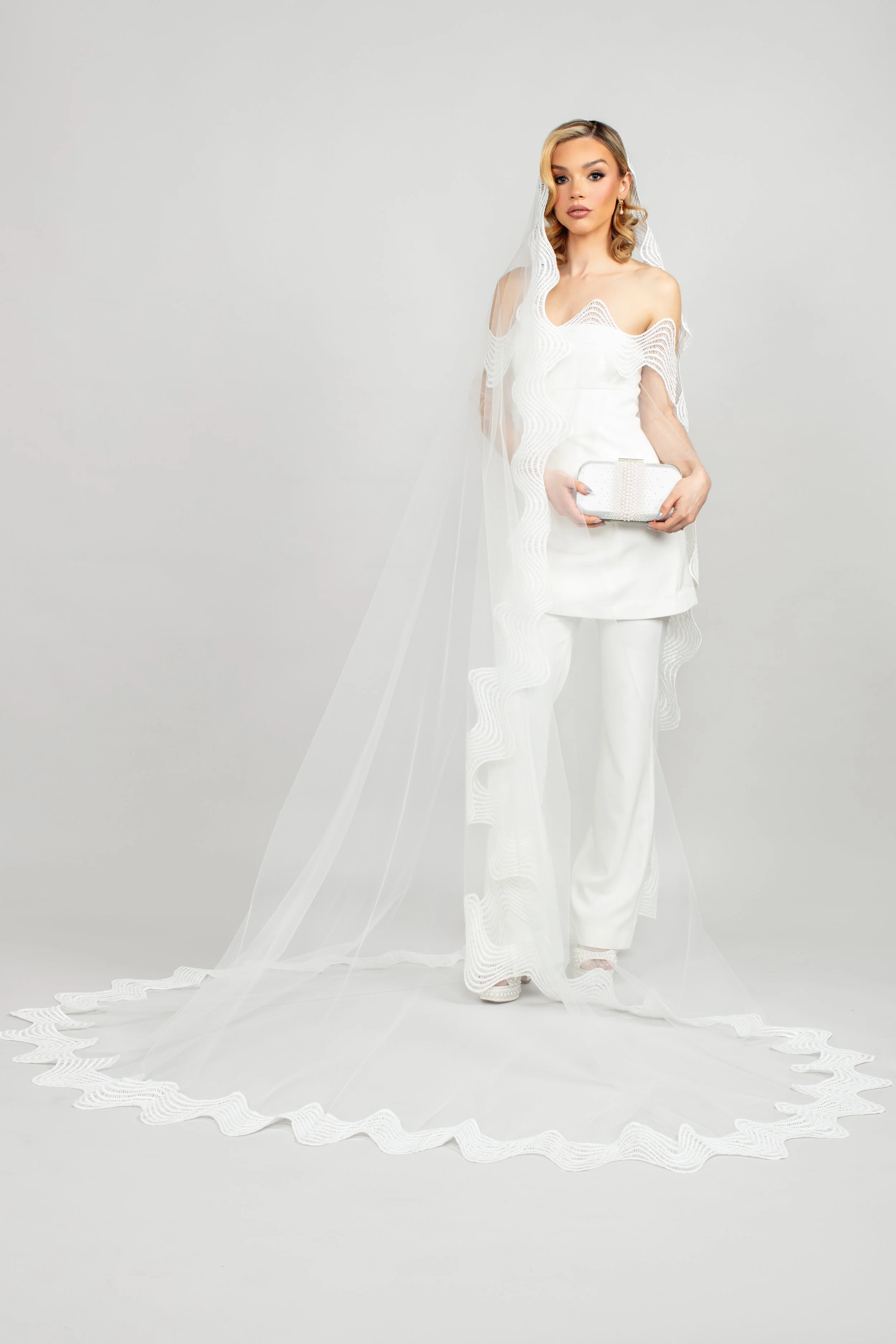 Venus veil, Vivian caplet, Tresor clutch, Urbana earrings_cropped.jpg