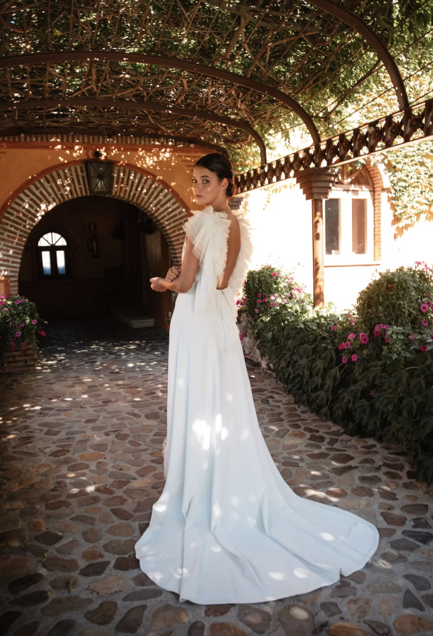 Raquel López at Melange de Blanc dress 6