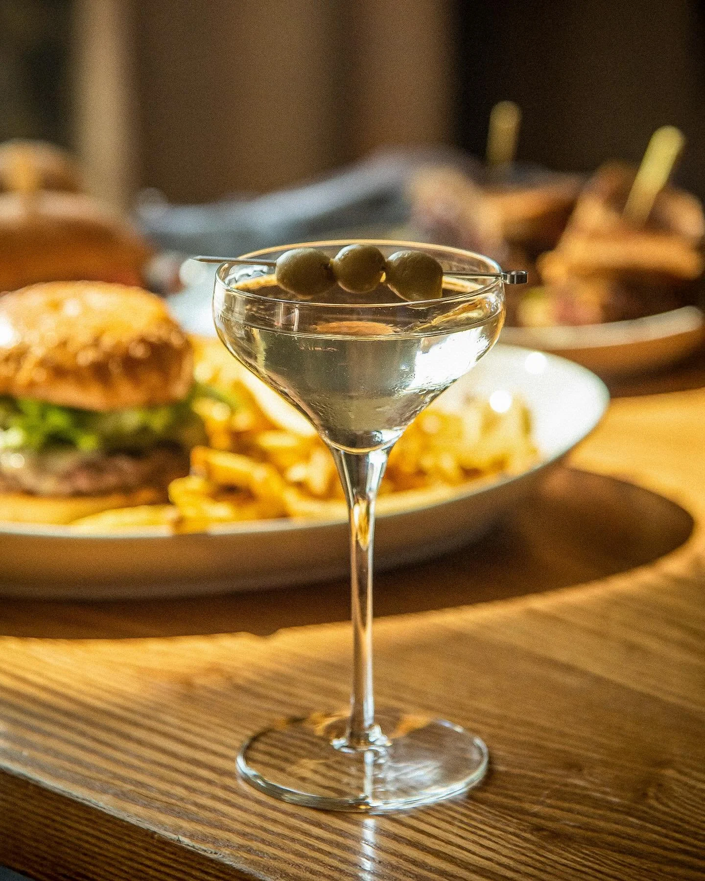 Shaken, stirred, and served with fries 🍔 

Happy hour 4PM-6PM 🍸 

Then hang around for live music 6PM-8PM 🎶

Dinner reservations available via OpenTable (link bio).