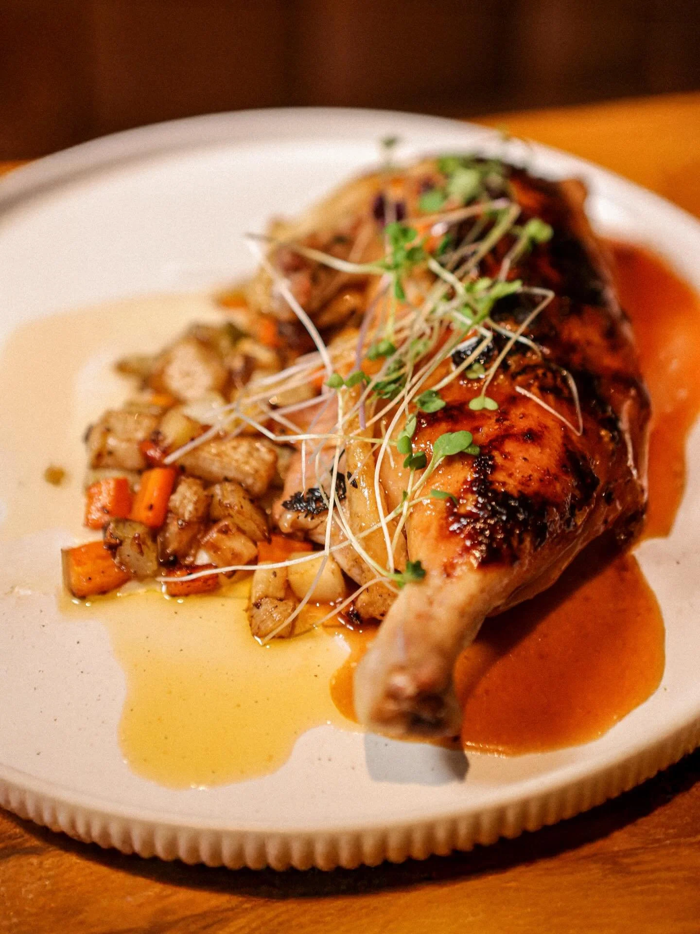 Comfort food.

Slow Roasted Chicken Coq au Vin.

Cauliflower Pur&eacute;e, Roasted Root Vegetables, Baby Greens, Port &amp; Shallot Sauce.

Available on the dinner menu!