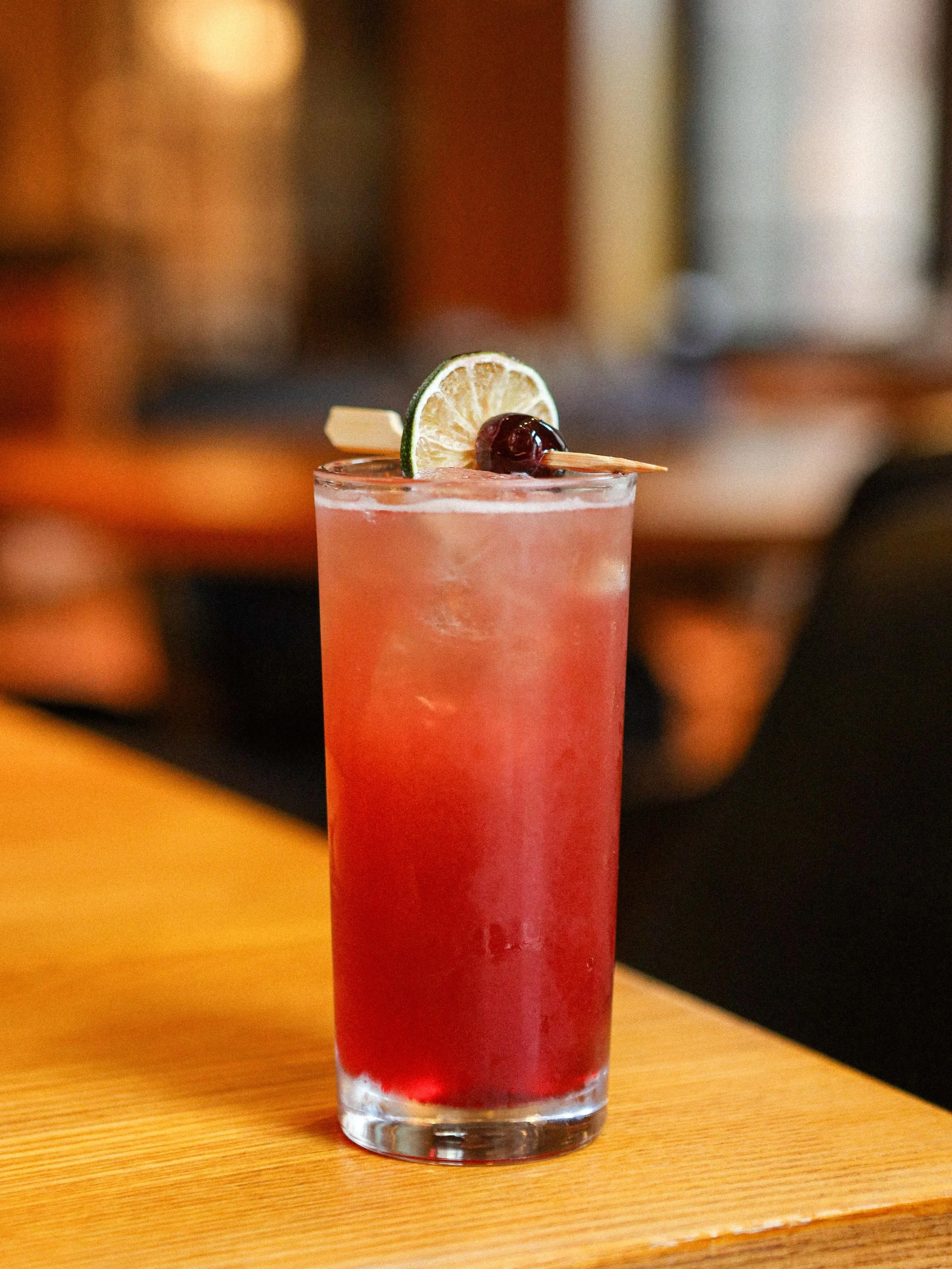 Cherry Bark Tonic 🍒🪾

Cherry Bark Rum, Kronan Swedish Rum Punsch, Creole Rhum Clement, Grapefruit Shrub, Honey Simple, Allspice Dram, Lemon, Tonic, Angostura Bitters.