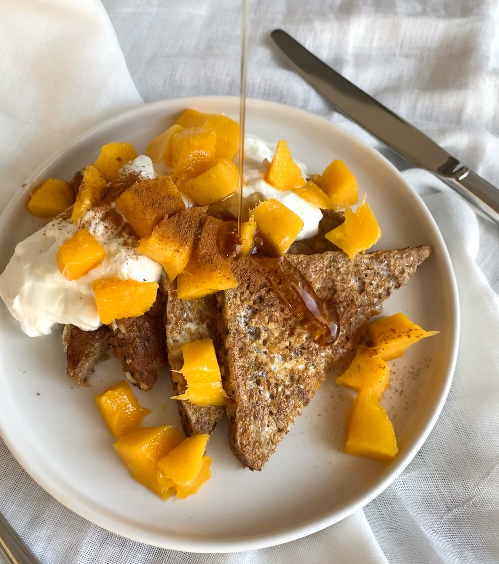  sweet french toast with greek yogurt, cinnamon,  mangoes, and maple syrup 
