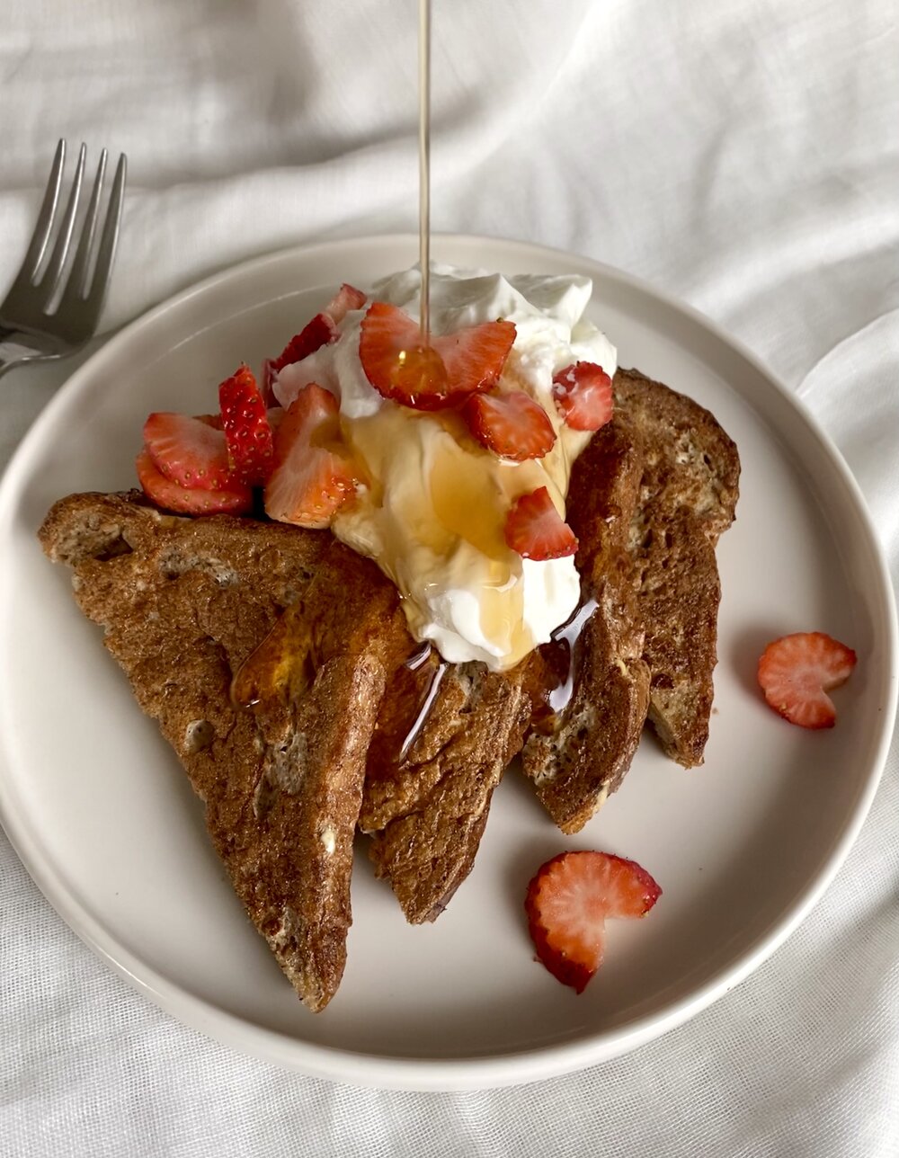  sweet french toast with greek yogurt, strawberries, and maple syrup 