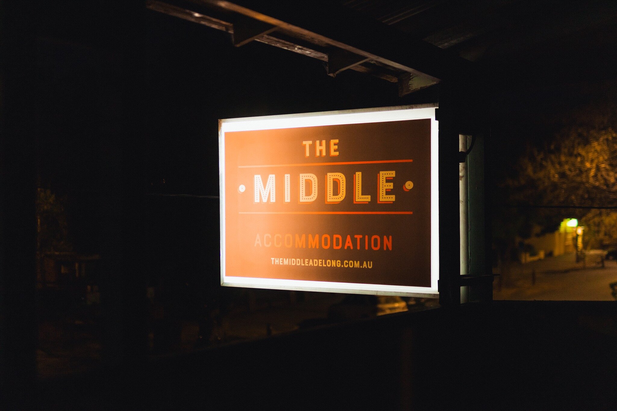 THE MIDDLE | Adelong - open for bookings. THE MIDDLE, formerly a traditional Aussie pub in the beautiful Snowy Valleys town of Adelong, now offers affordable accommodation in nine newly renovated pub-style bedrooms with quality features and shared ba