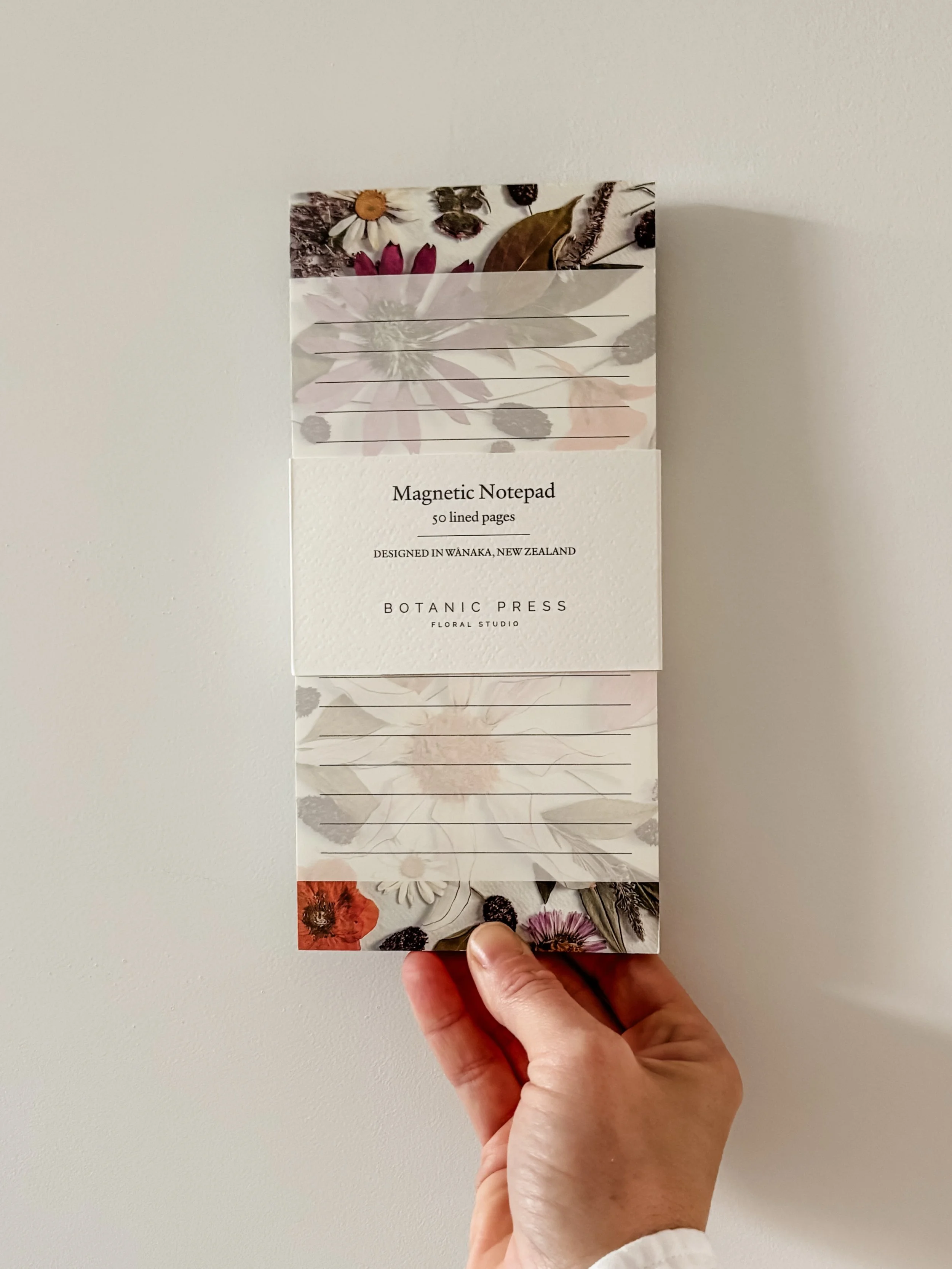 Introducing our Magnetic Notepad 💚

Featuring our signature pressed floral composition, this piece was designed to bring a little beauty to everyday lists, notes, and reminders.
Designed in Wānaka, New Zealand and printed on thick, premium paper wit