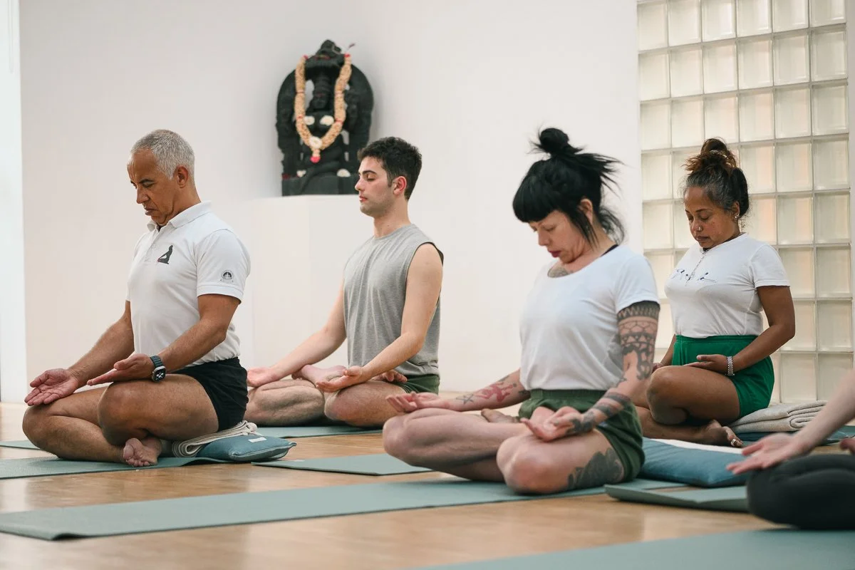 Authentic Iyengar yoga practice photographed in natural light at Iyengar Yoga London