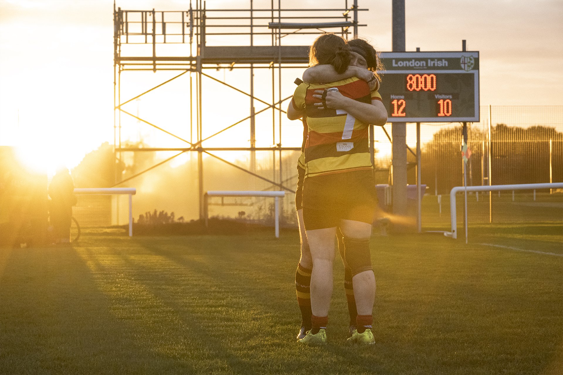 Two Richmond Women players console each other at the final whistle after defeat to London Irish, by Karen Yeomans