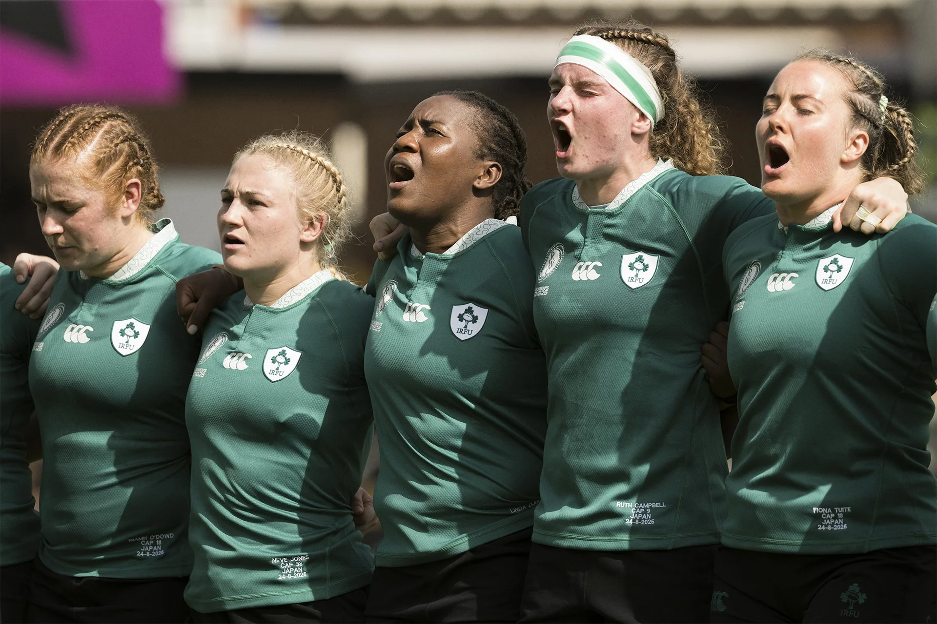 Ireland players arm in arm during the anthem before Japan, Women's Rugby World Cup 2025, Northampton, by Karen Yeomans