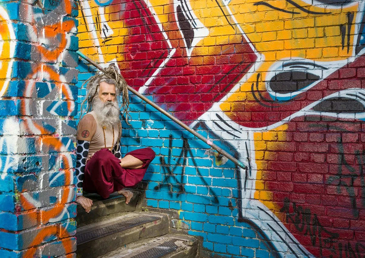  Stewart Gilchrest in padmasana graffiti stairs Shoreditch 