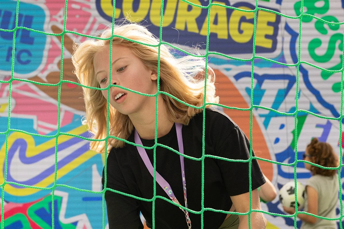  Nike Rebel Girls playing football 