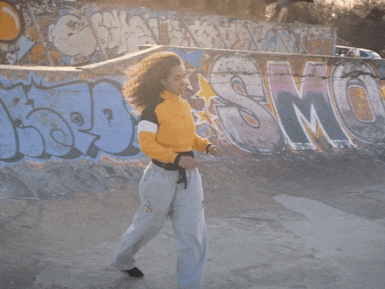 Parkour athlete and stunt performer Georgia Munroe at a graffiti-covered London skatepark