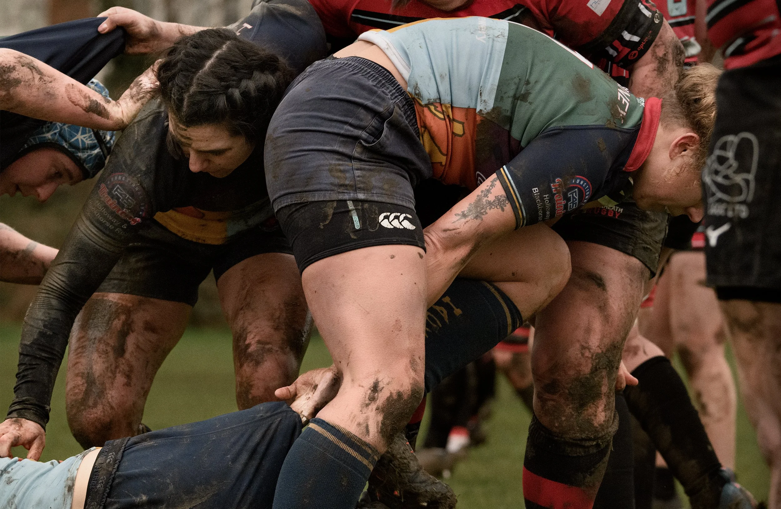 Muddy women's rugby match played in February 2024 at Hackney Ladies
