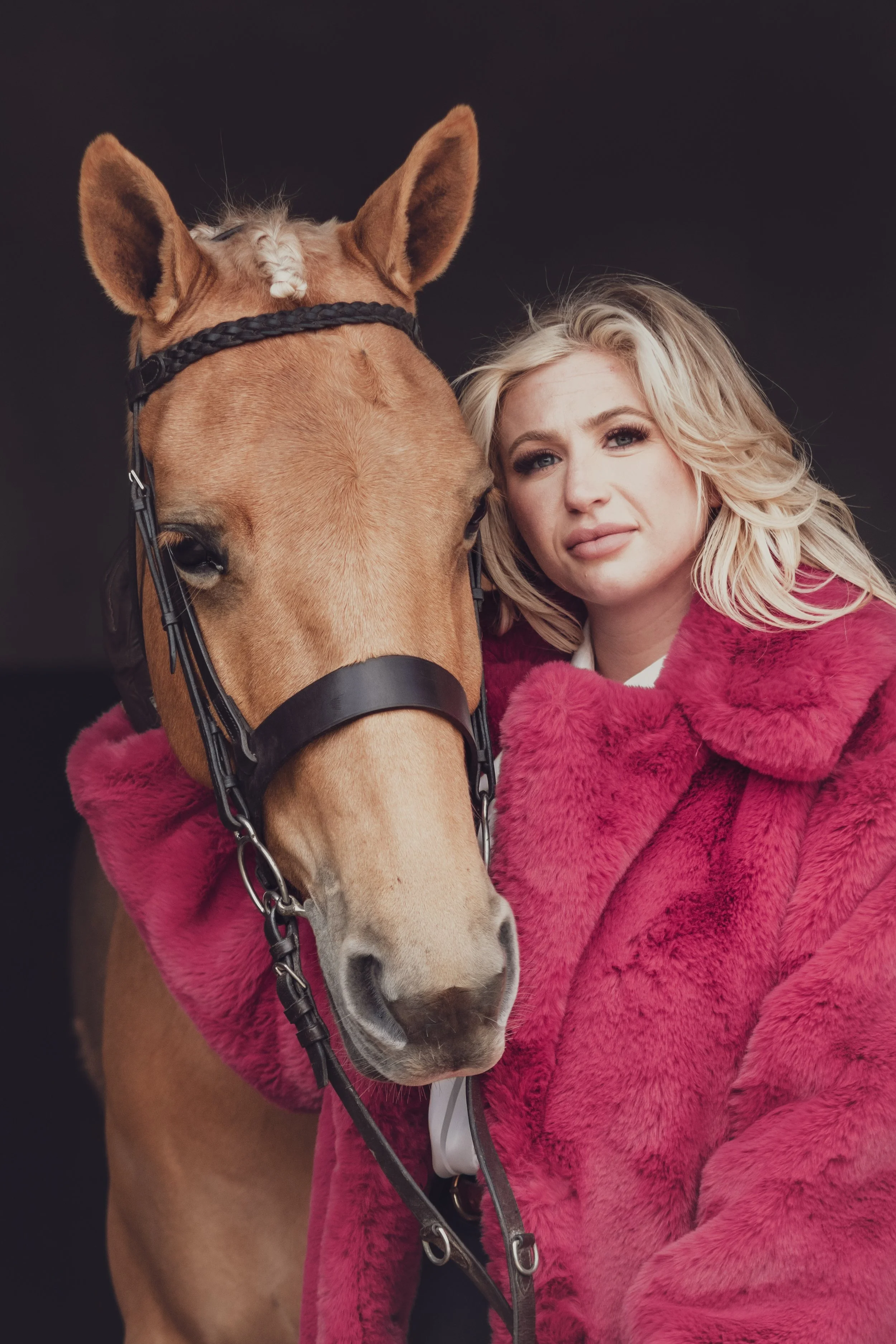 barbie and her palomino mare in the stable doorway