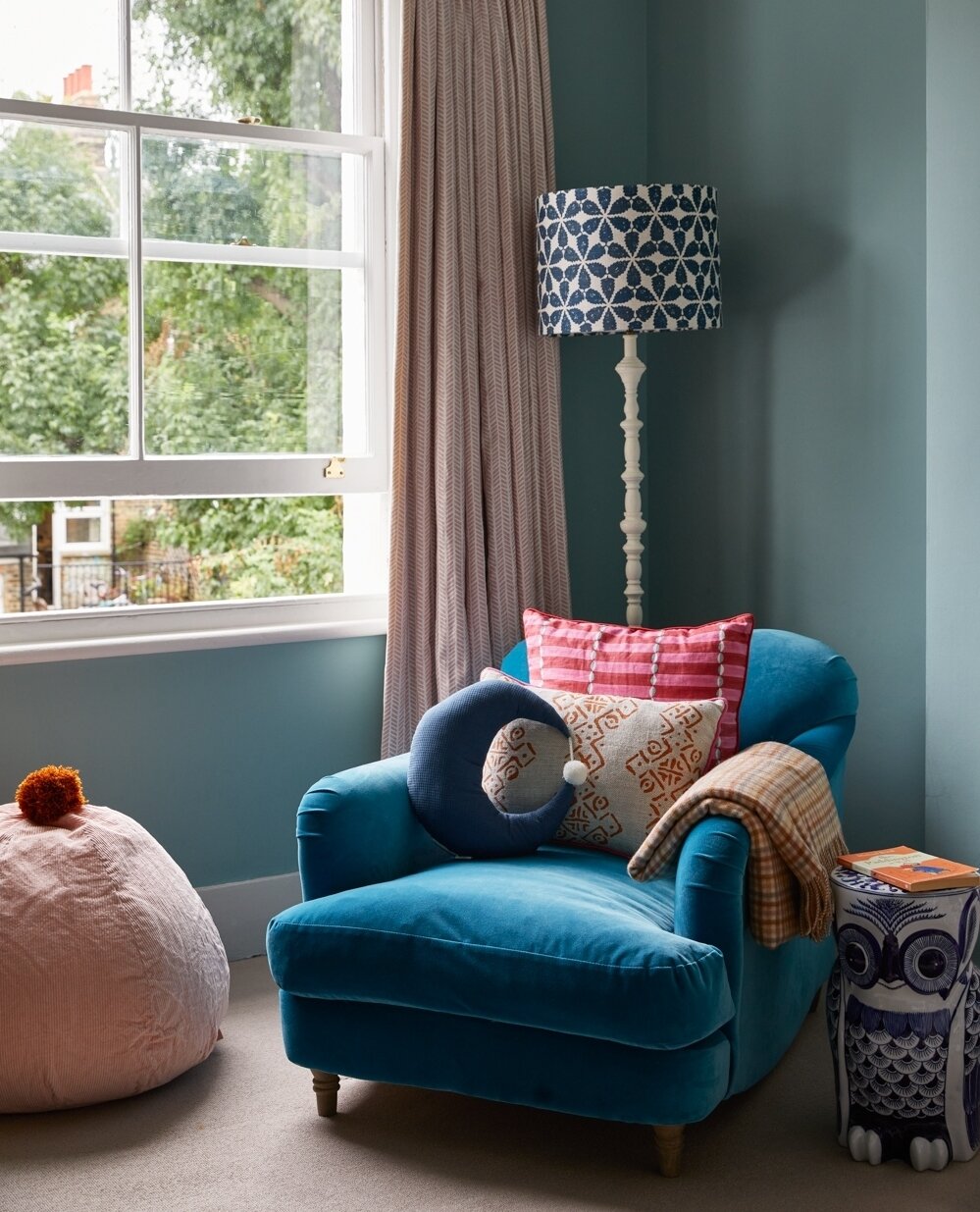 We love this cosy reading corner, designed for one of our London projects. Its perfect for parents to sit and read with their kids, or for a child to snuggle up with a book of their own. A table and a good lamp are always necessities when creating a 