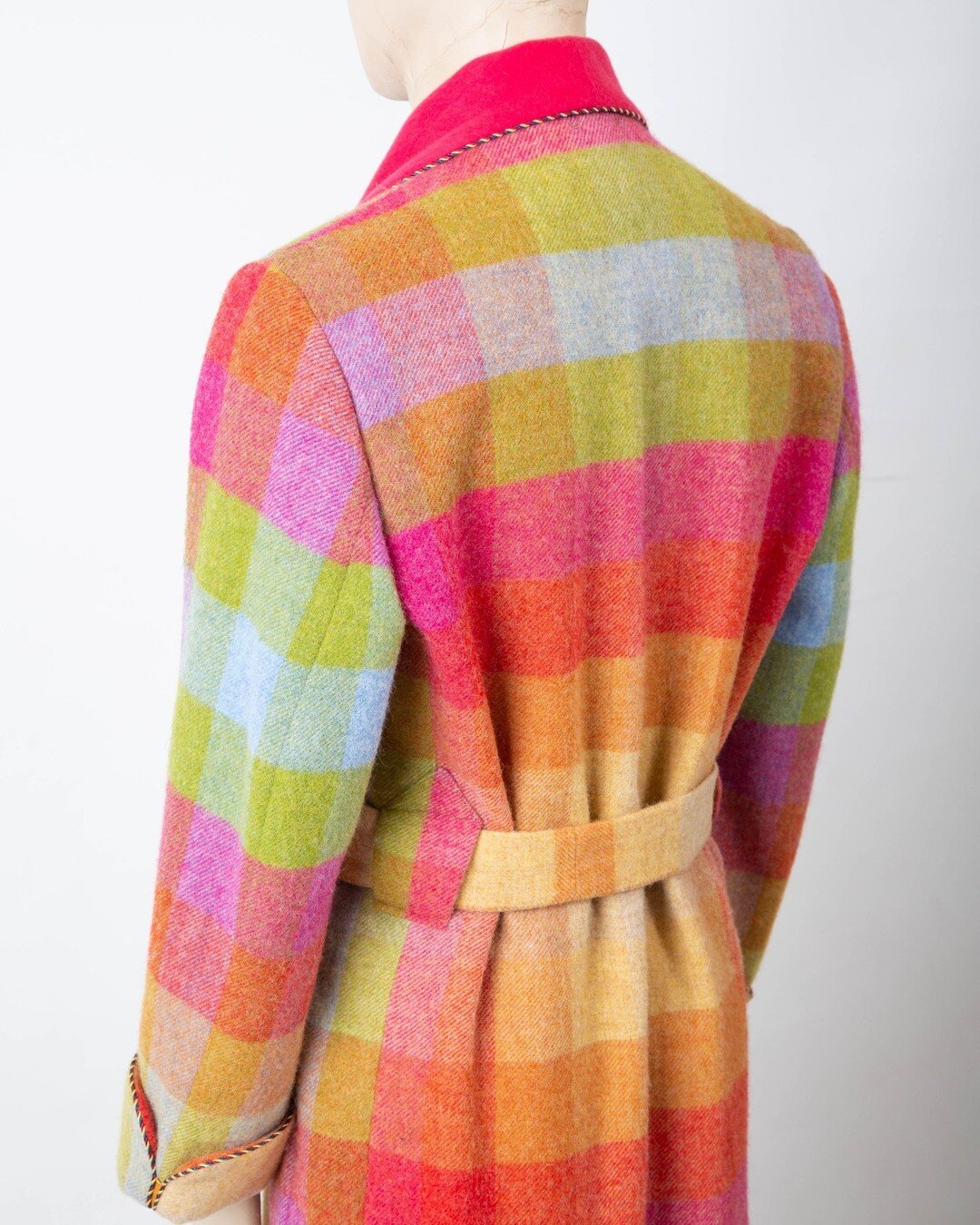 Hyper colourful new designs inspired by Nicholas Hanson&rsquo;s artisanal creations are perfect for keeping some sunshine close during the darker seasons.

This gown is cut from @abrahammoonsons pure wool, with contrast facings cut from woven, 340gms