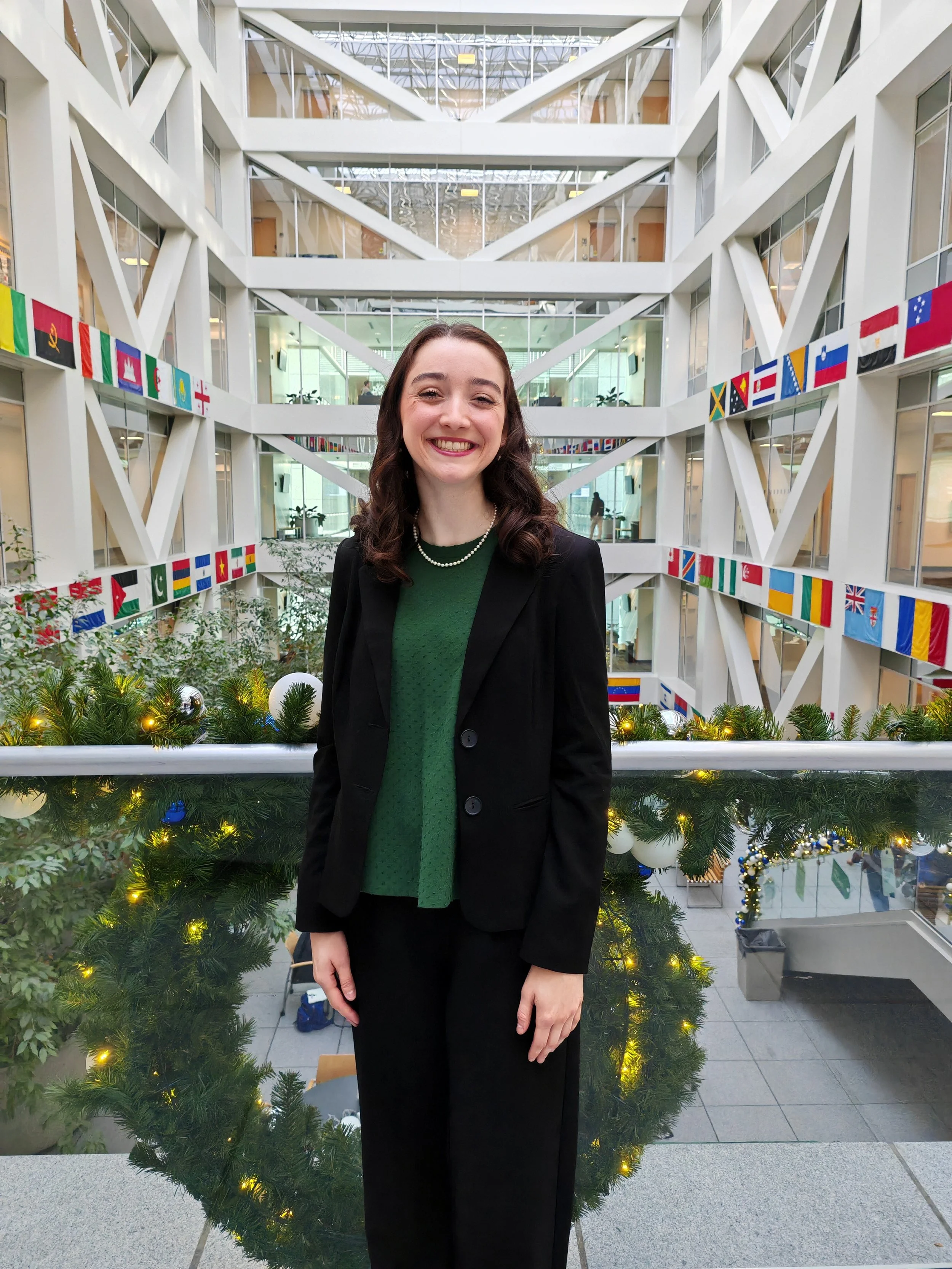 Woman standing in an atrium