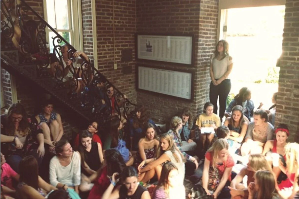 A grainy photo from 2012 inside the Belmont University bell tower filled with college women when Delight first began as a Bible study.