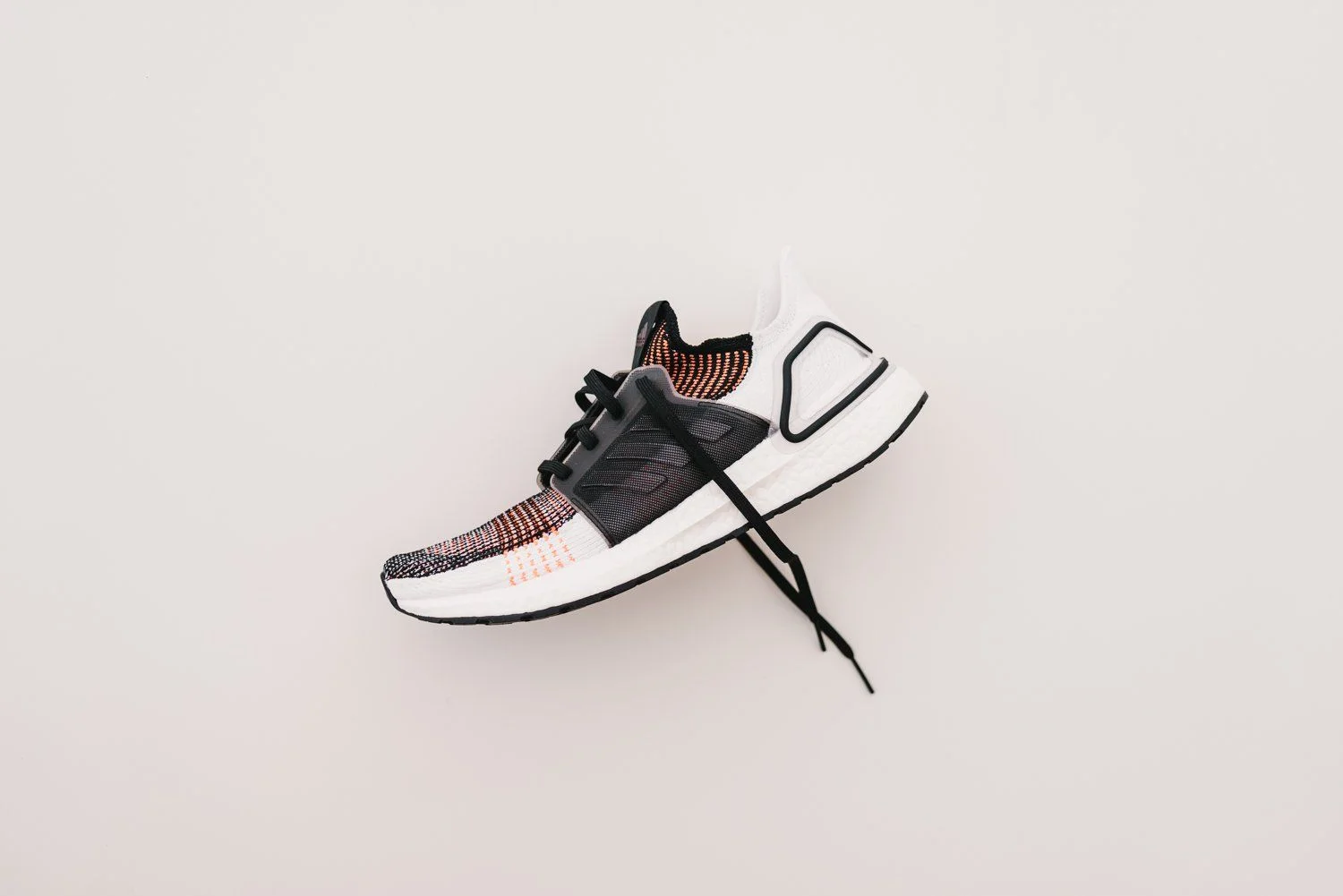 The "Coreblack/Infrared" adidas Ultra Boost 19 Is On Sale For $100 Shipped!