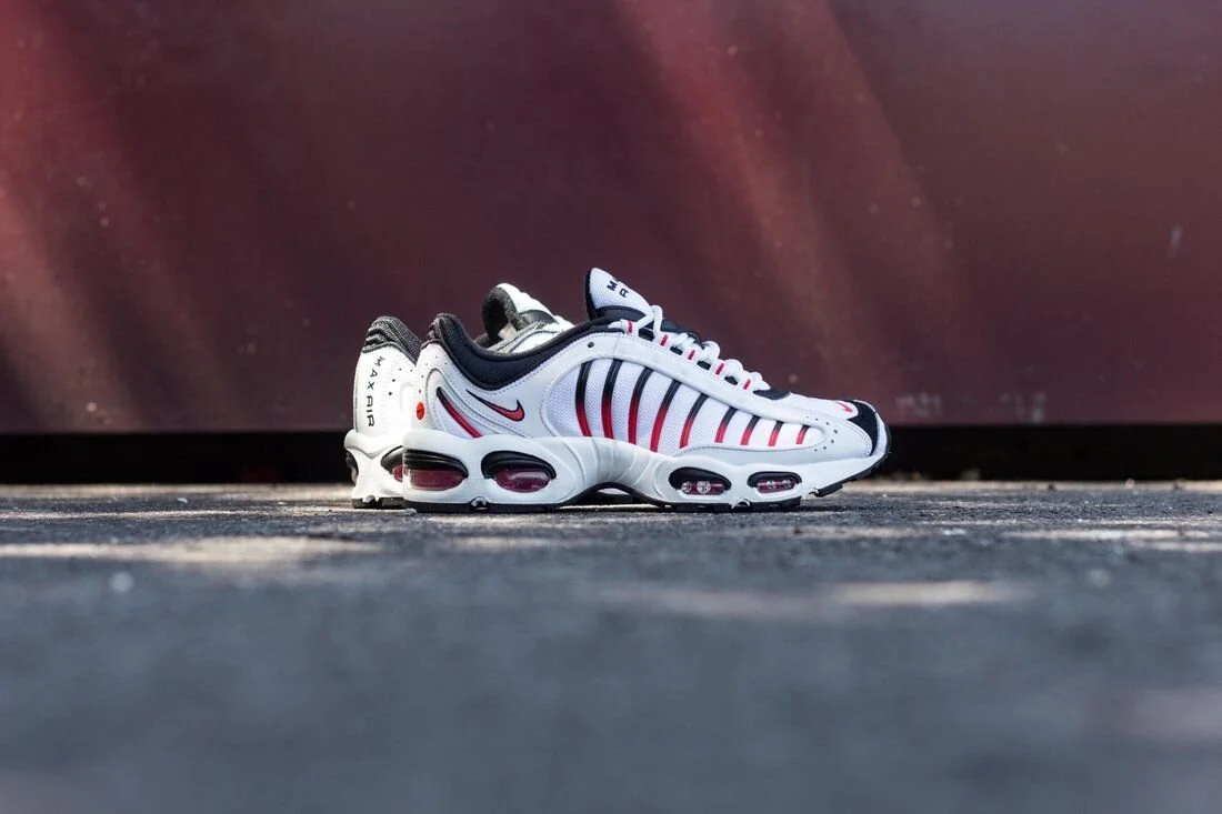 The Nike Tailwind IV In "Habanero/Black" Is On Sale For $56!