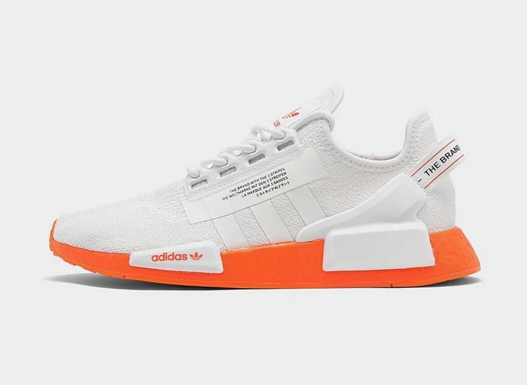 The adidas NMD_R1 V2 ‘White/Solar Red Is On Sale For Under Retail!